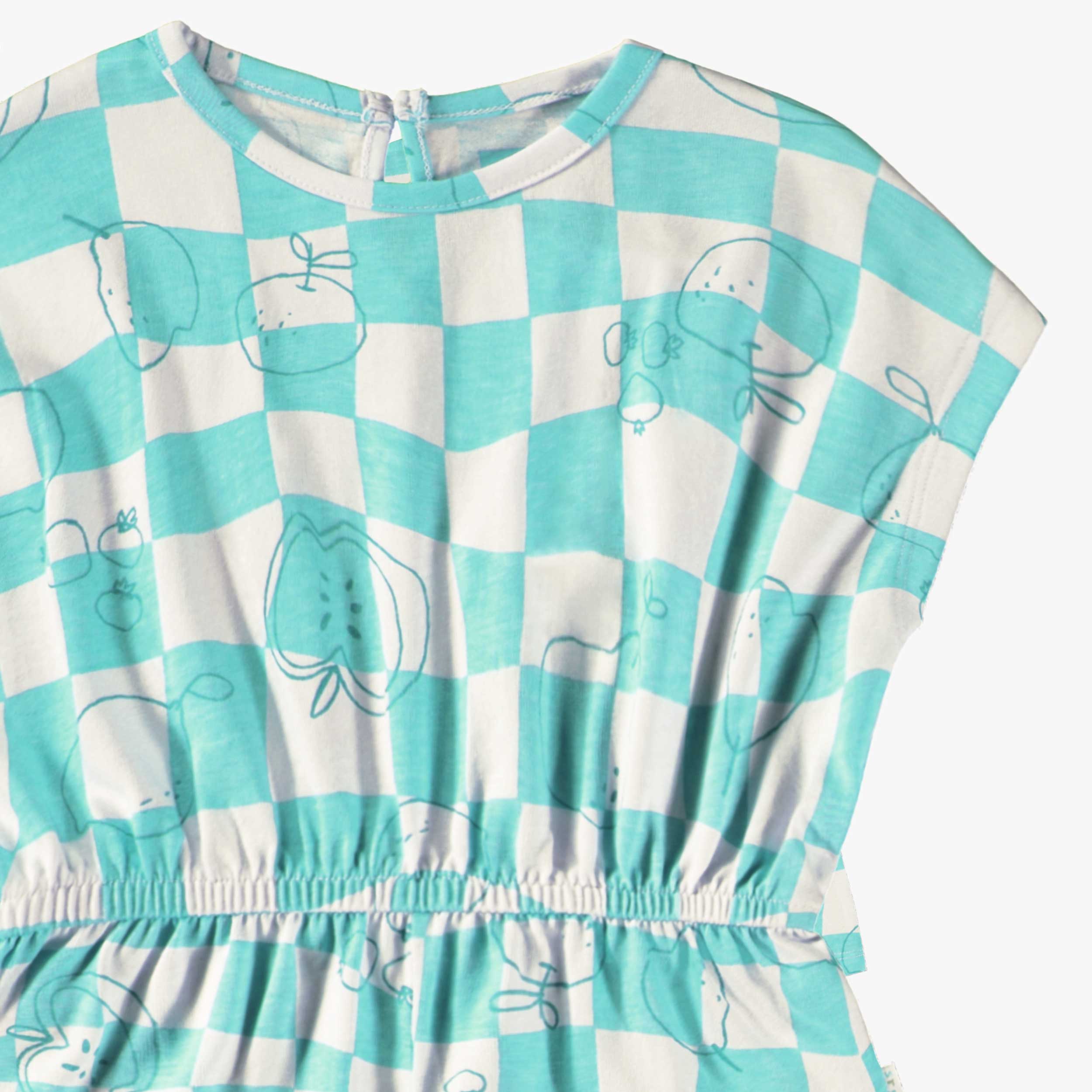 Détail du combishort bleu aqua et crème à carreaux et motifs, bébé