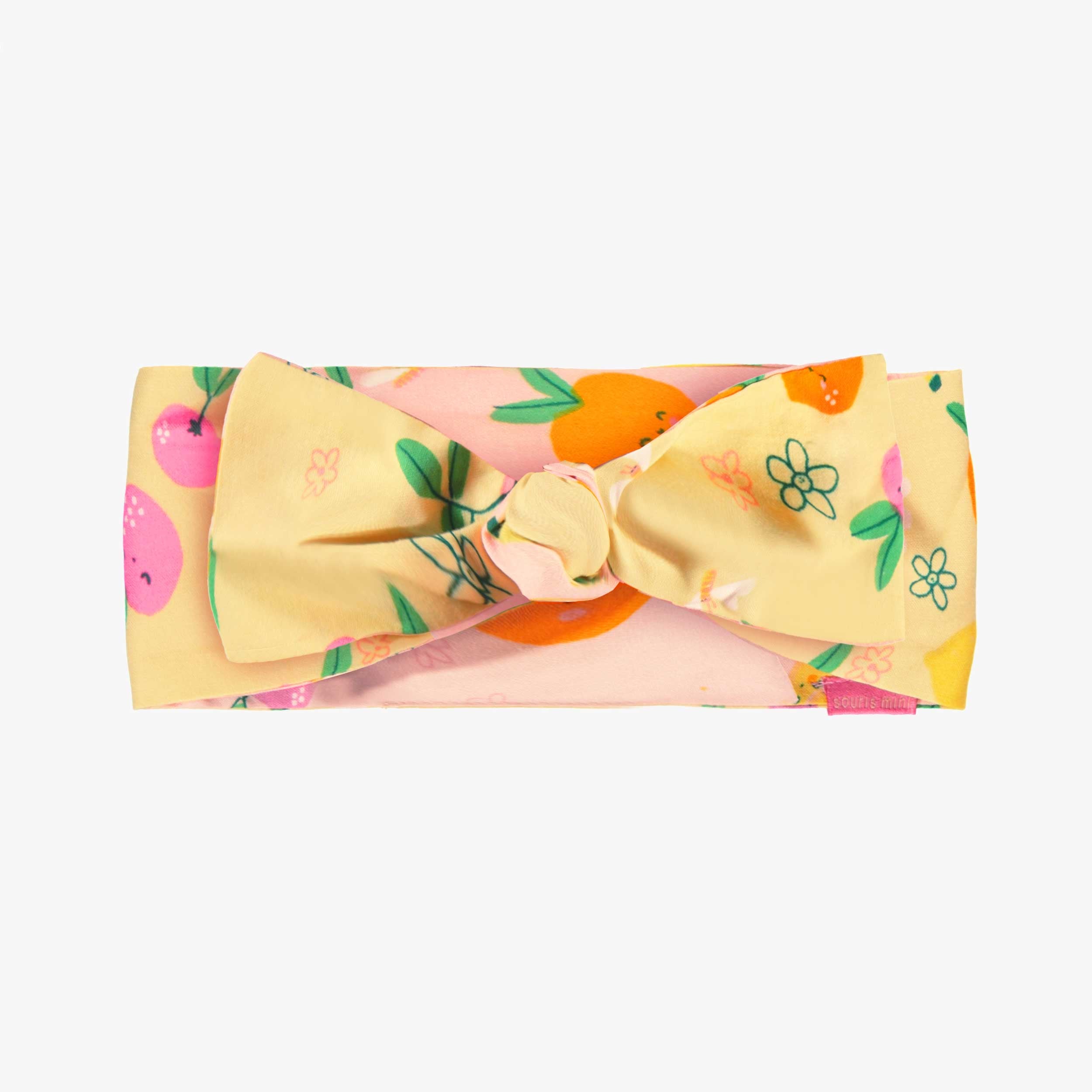 Autre côté du bandeau réversible rose et jaune à motifs, enfant
