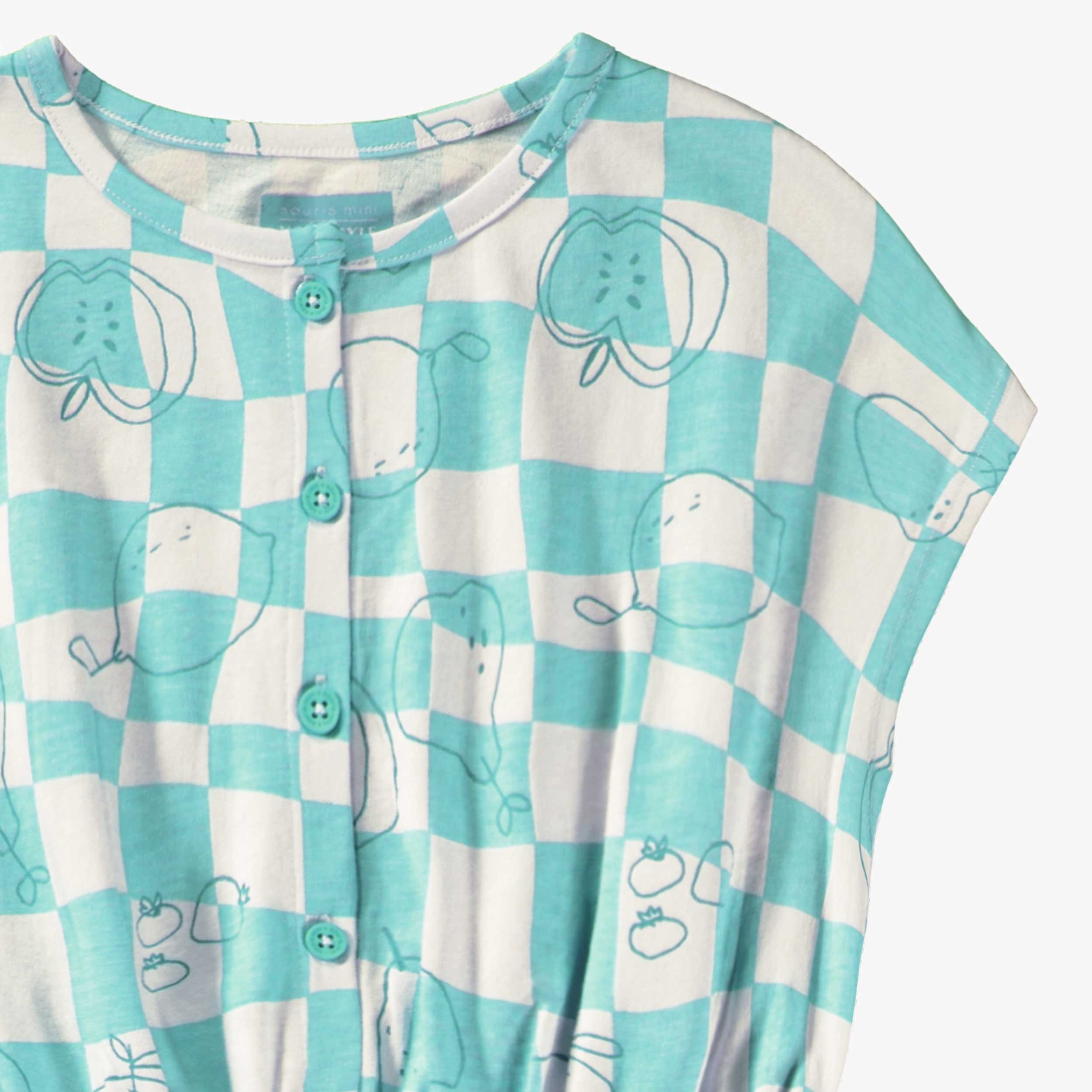 Détail du combishort bleu aqua et crème à carreaux et motifs, enfant