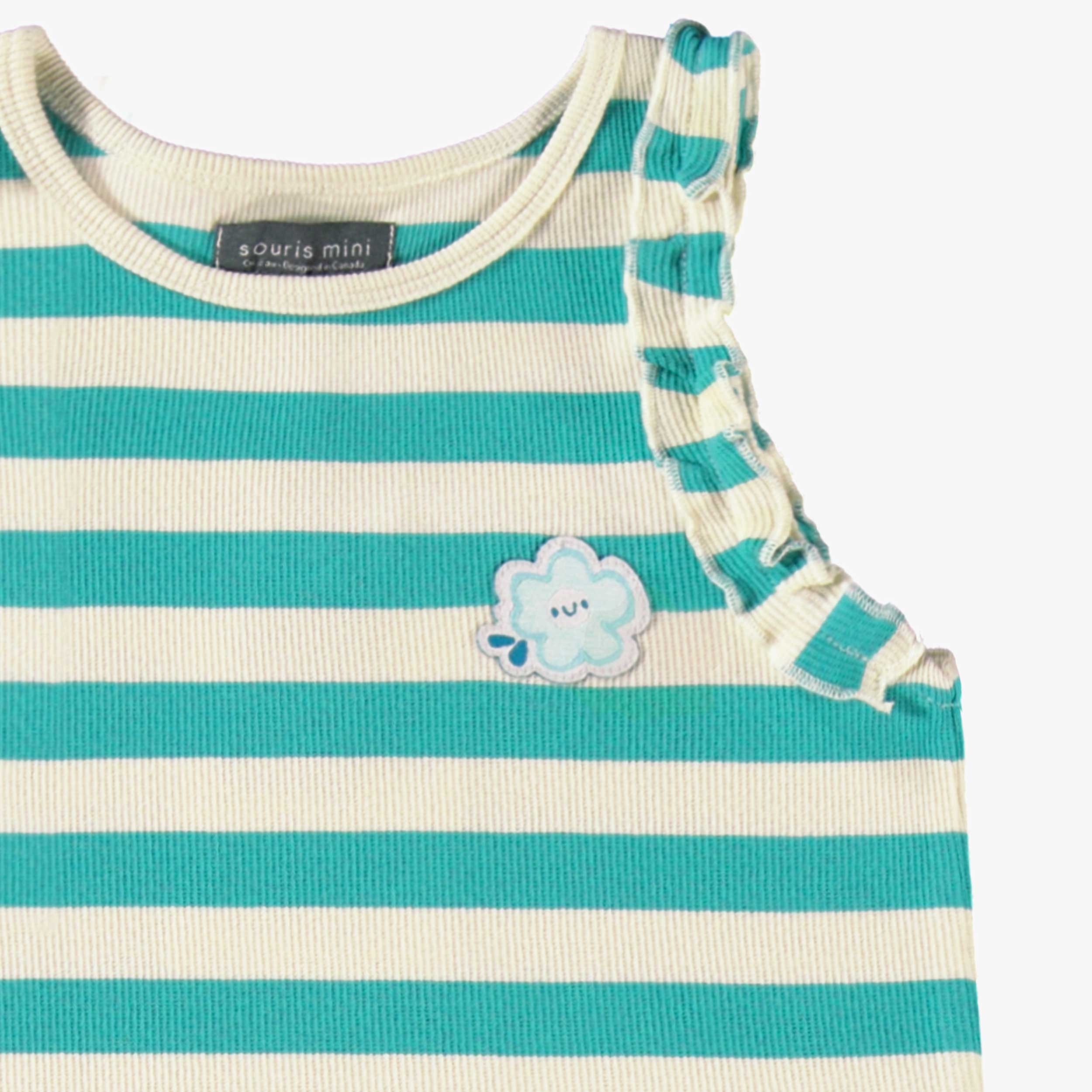 Détail de la robe crème et turquoise à rayures, enfant