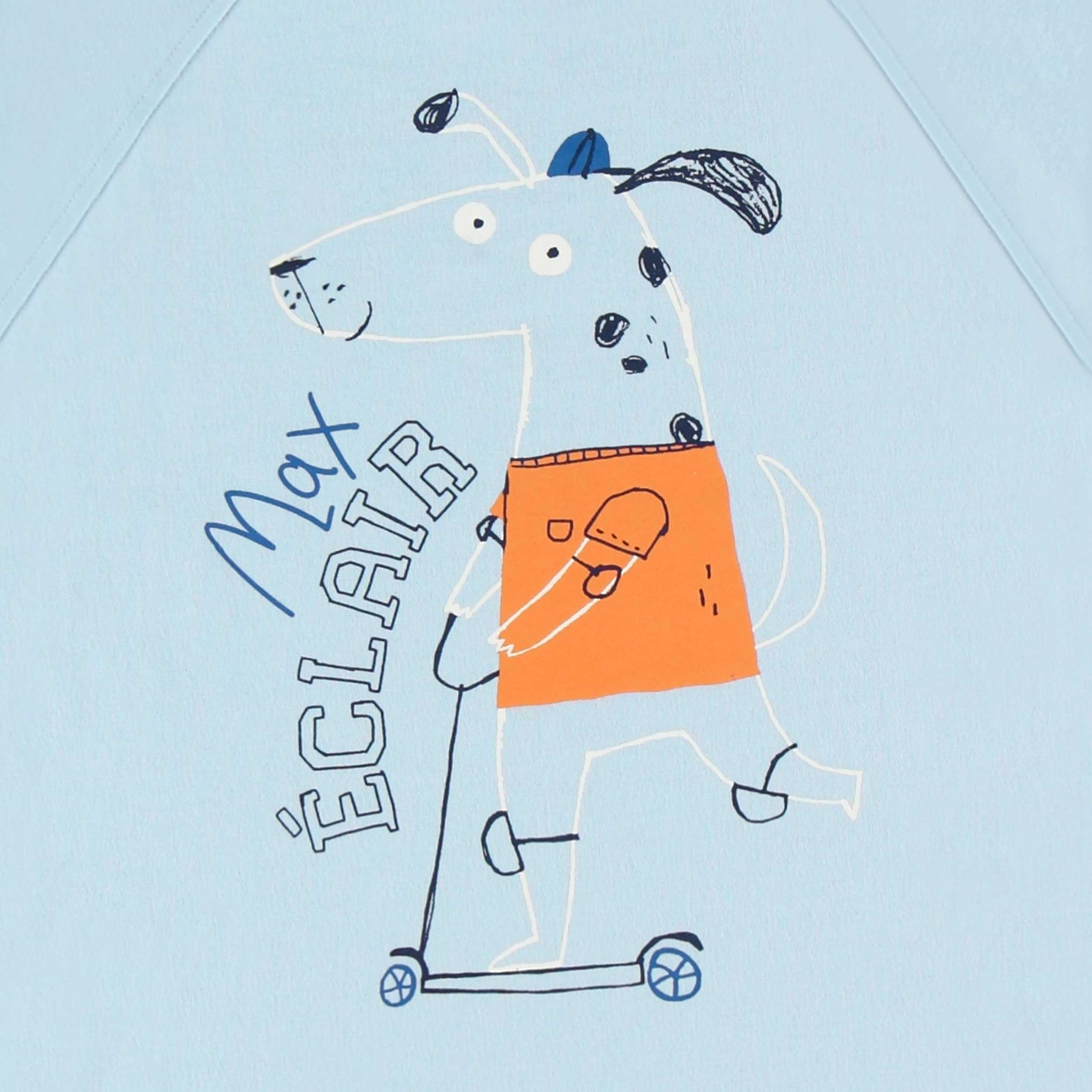 Détail du t-shirt sans manches bleu avec illustration, enfant