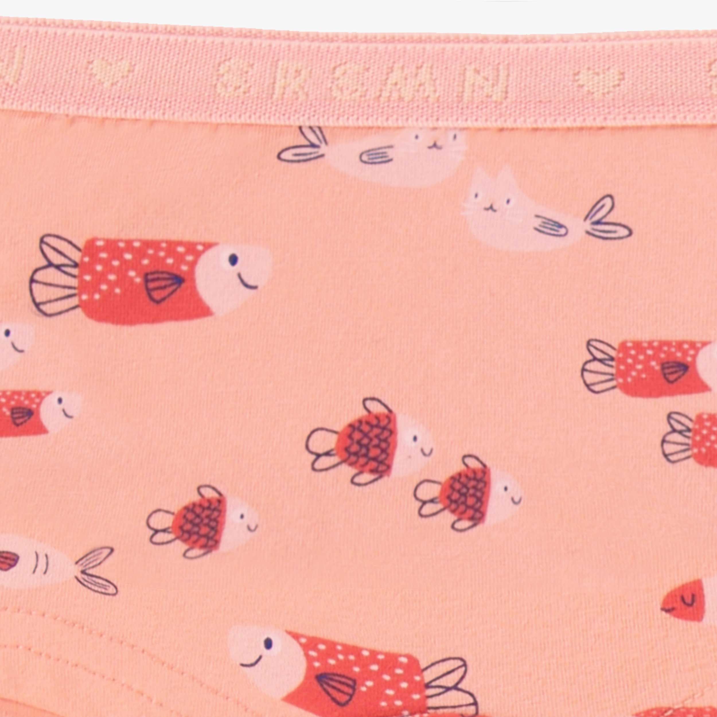 Détail de la culotte garçonne rose à motifs, enfant