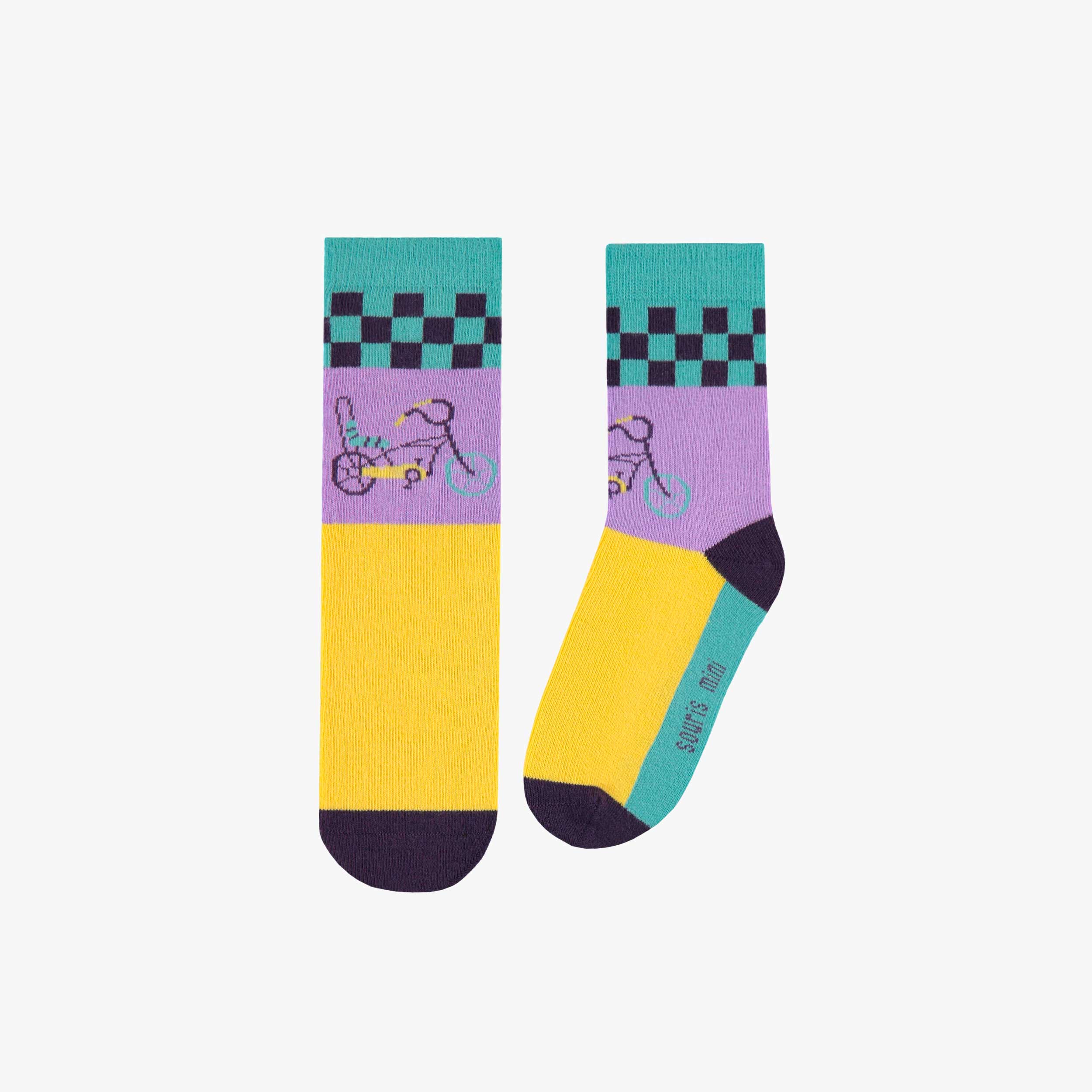 Chaussettes jaunes, mauves et turquoise avec une bicyclette, enfant