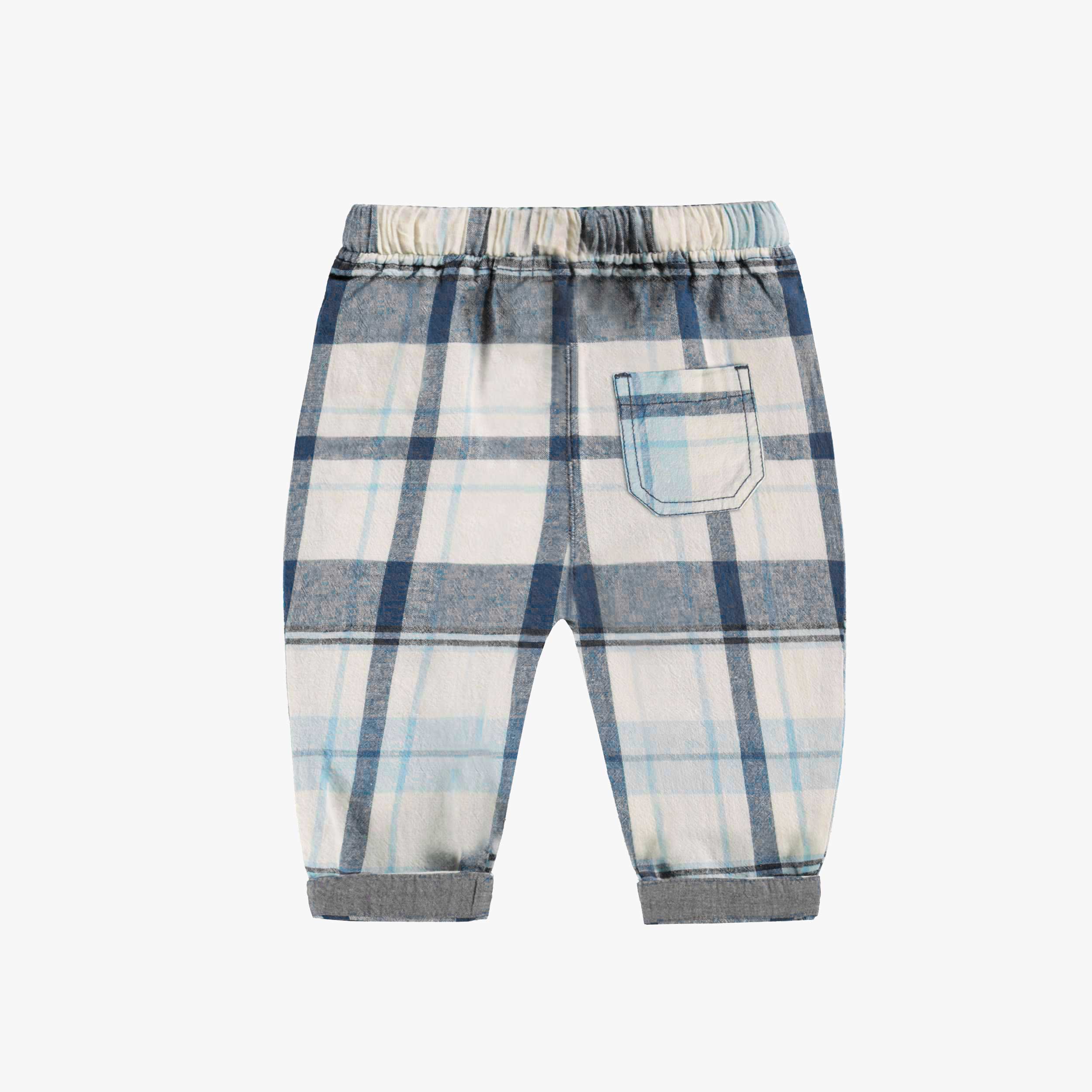 Dos du pantalon bleu et crème à carreaux, naissance