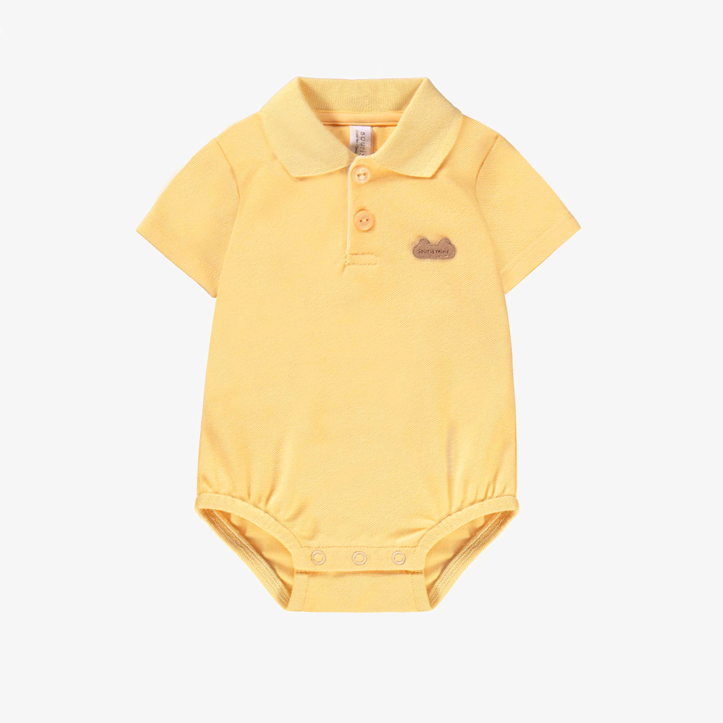 Cache-couche jaune en piqué avec col polo, naissance