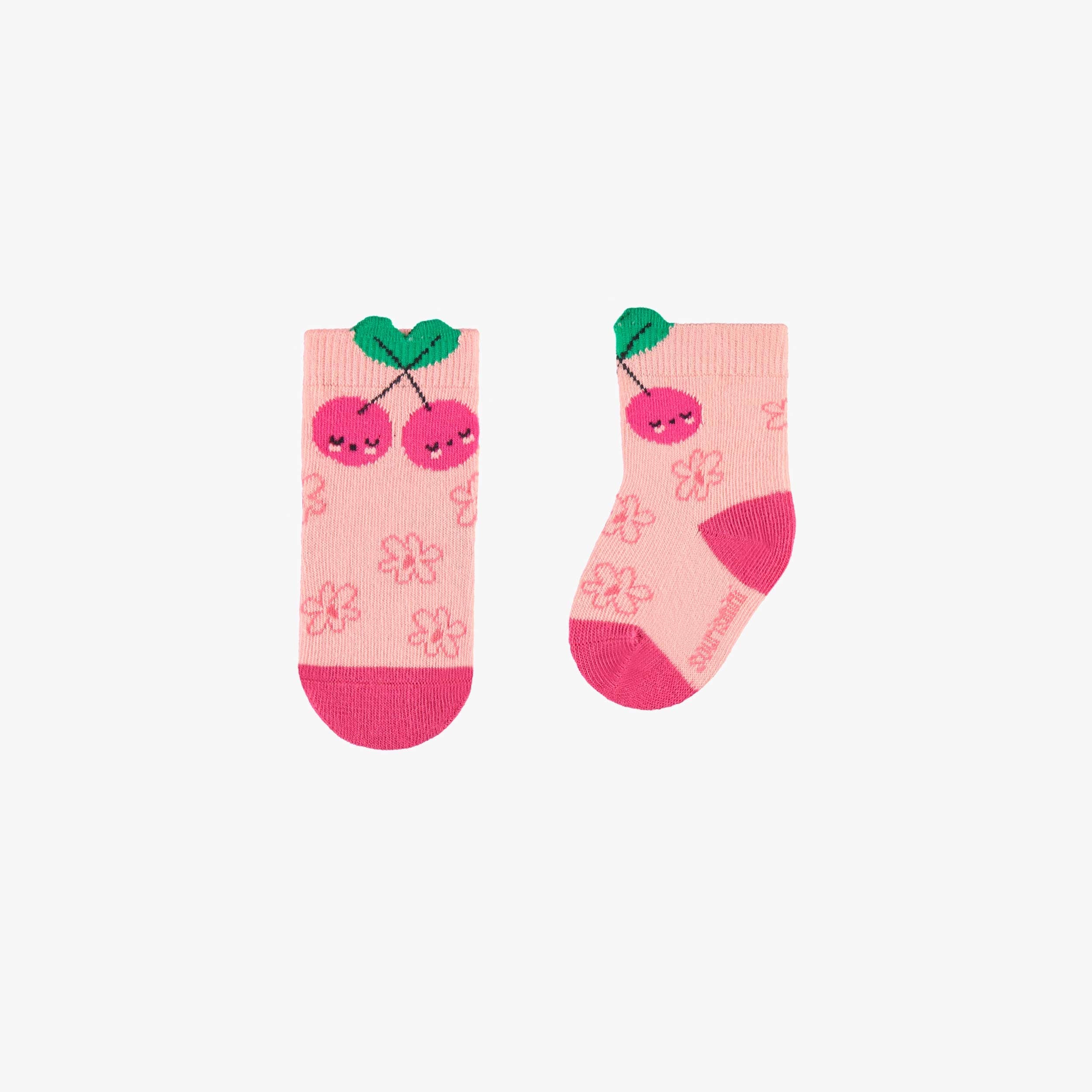 Chaussettes roses à motifs, naissance