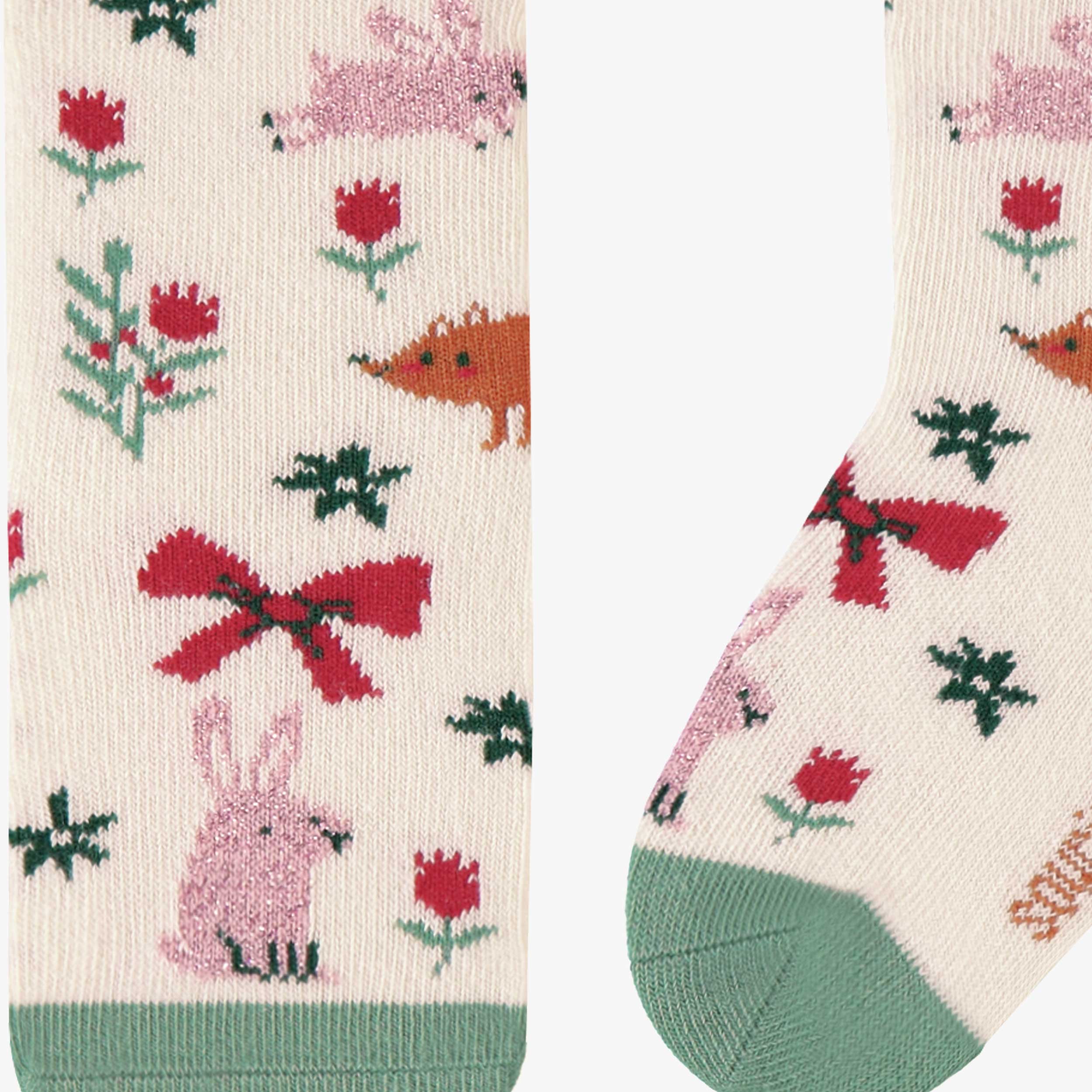 Zoom chaussettes crème à motifs festifs, bébé