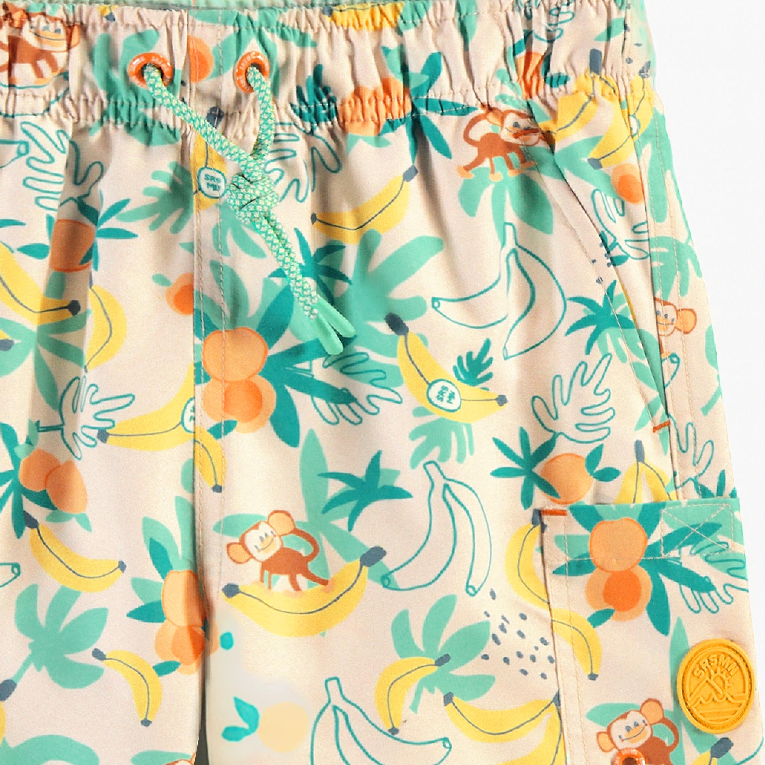 Zoom du bermuda de bain beige à motifs tropicaux, enfant - Souris Mini