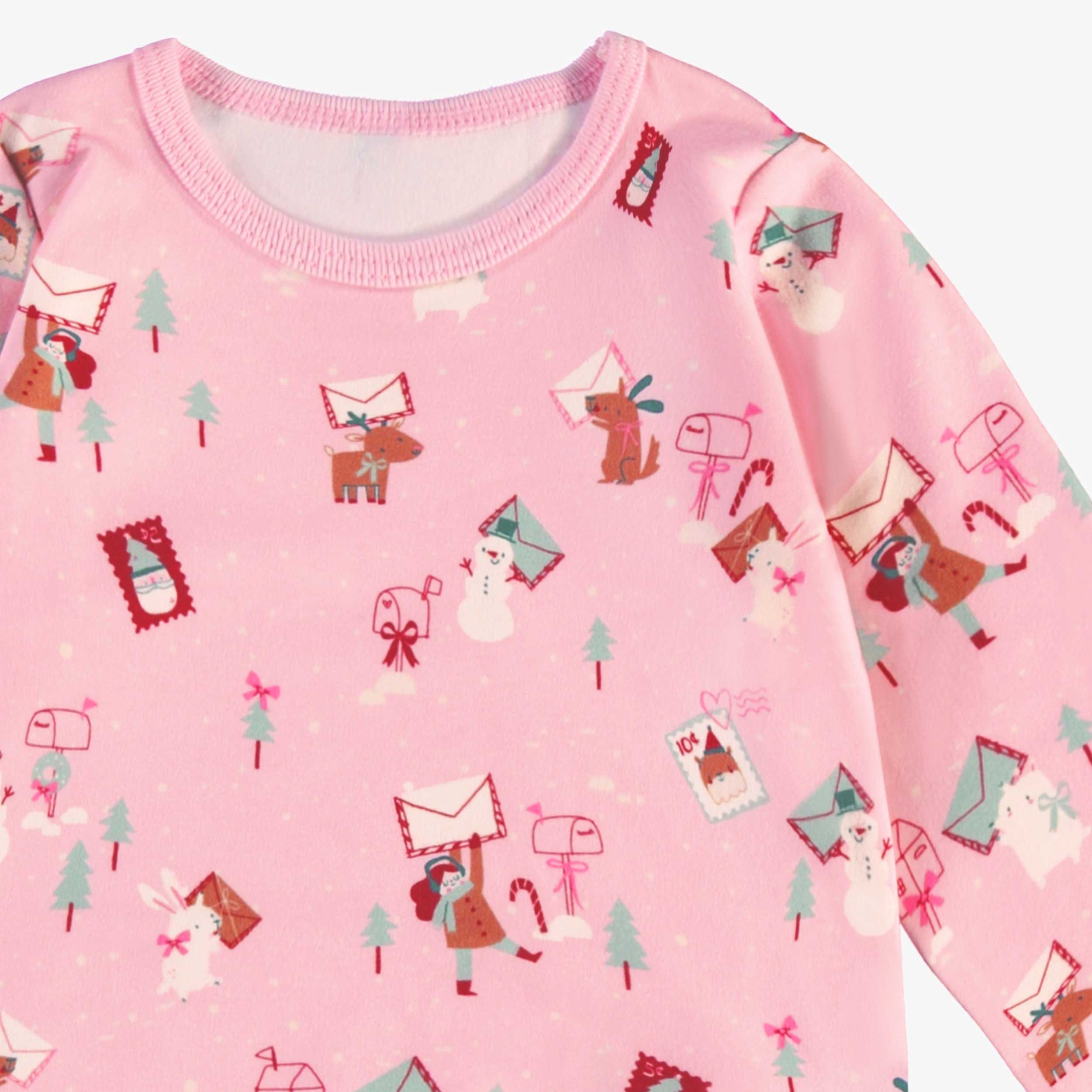 Zoom détails du cache-couche rose à motifs des Fêtes, bébé