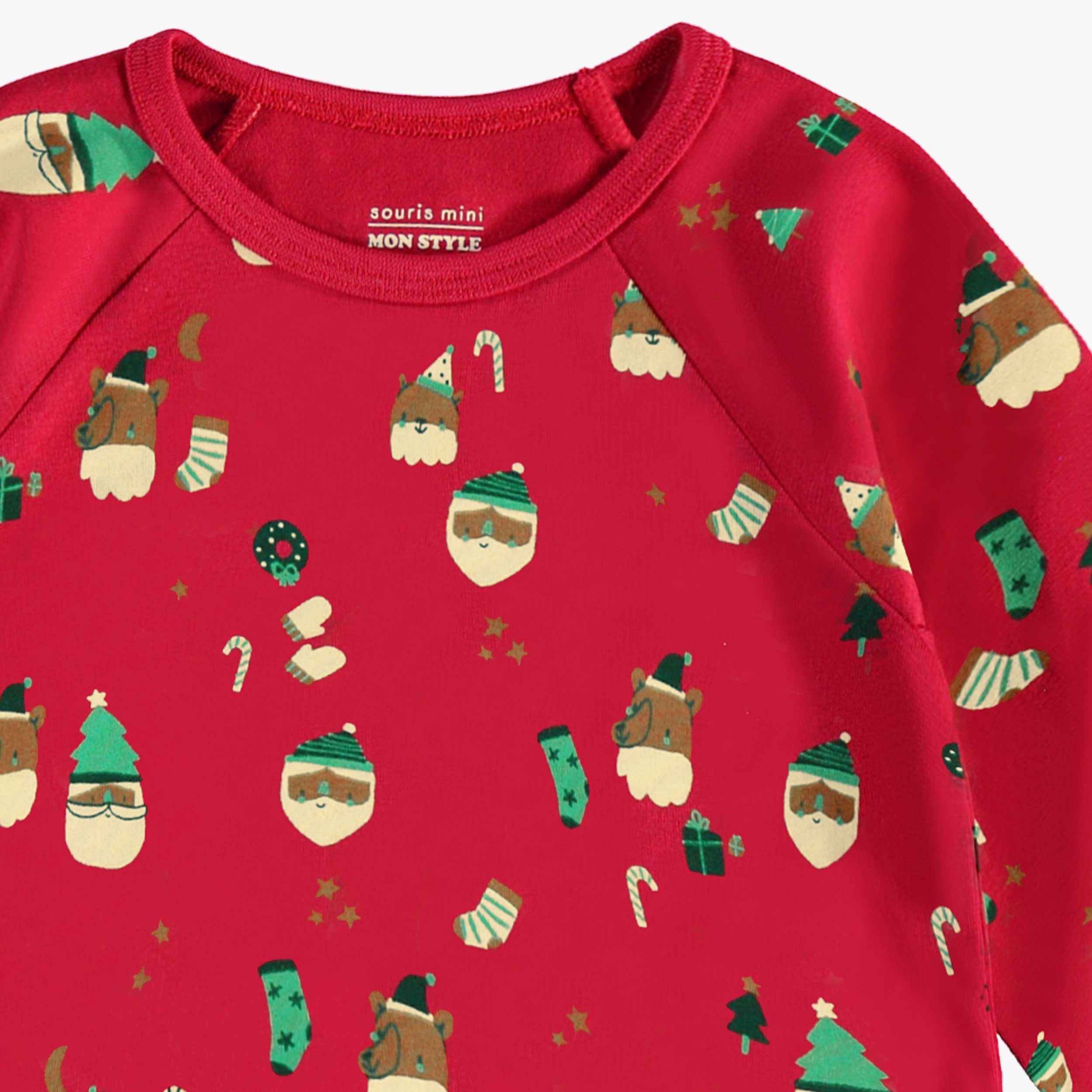 Zoom motifs du cache-couche rouge à motifs des Fêtes, bébé