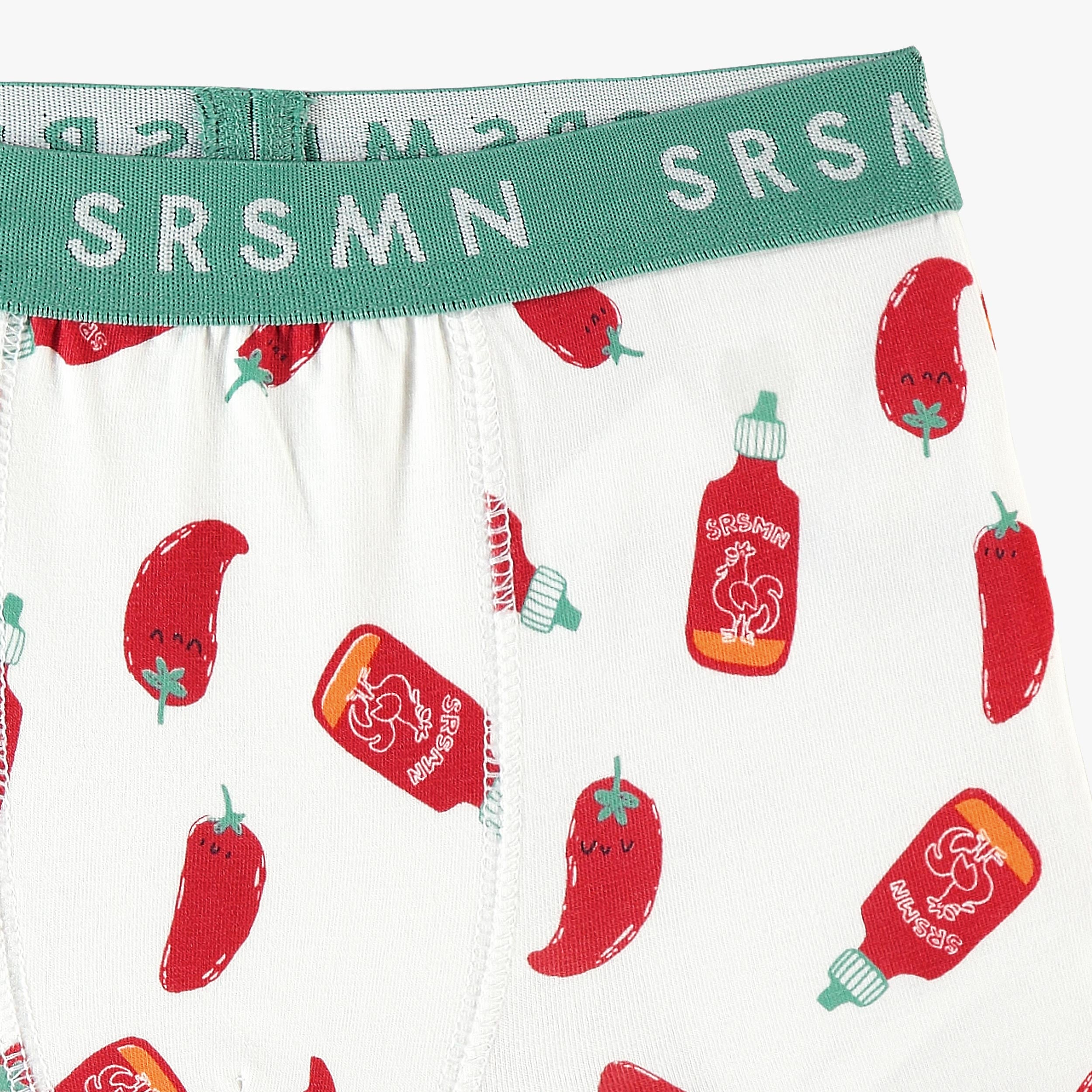 Zoom détails du boxer blanc à motifs de piments et sriracha, enfant
