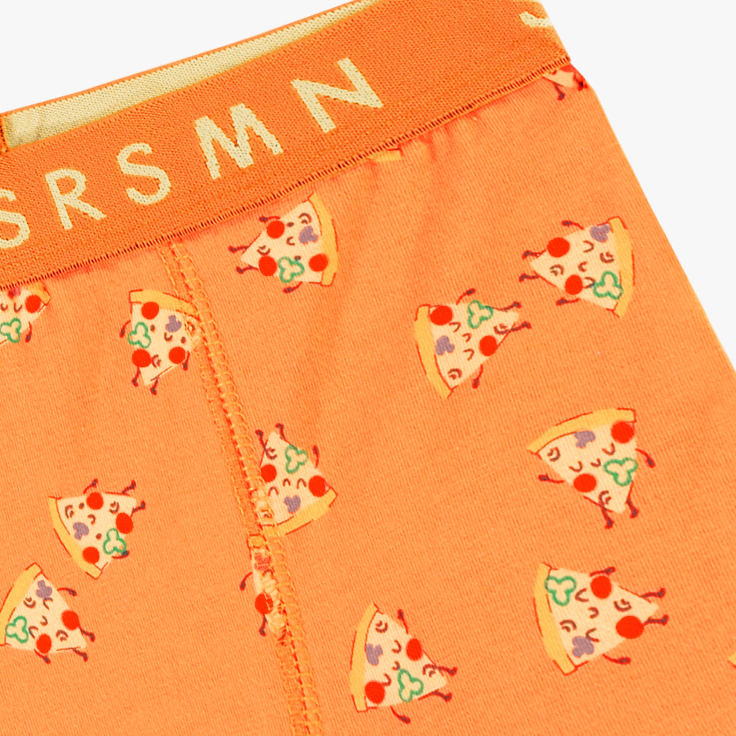 Zoom détails du boxer orange à motifs de pizzas, enfant