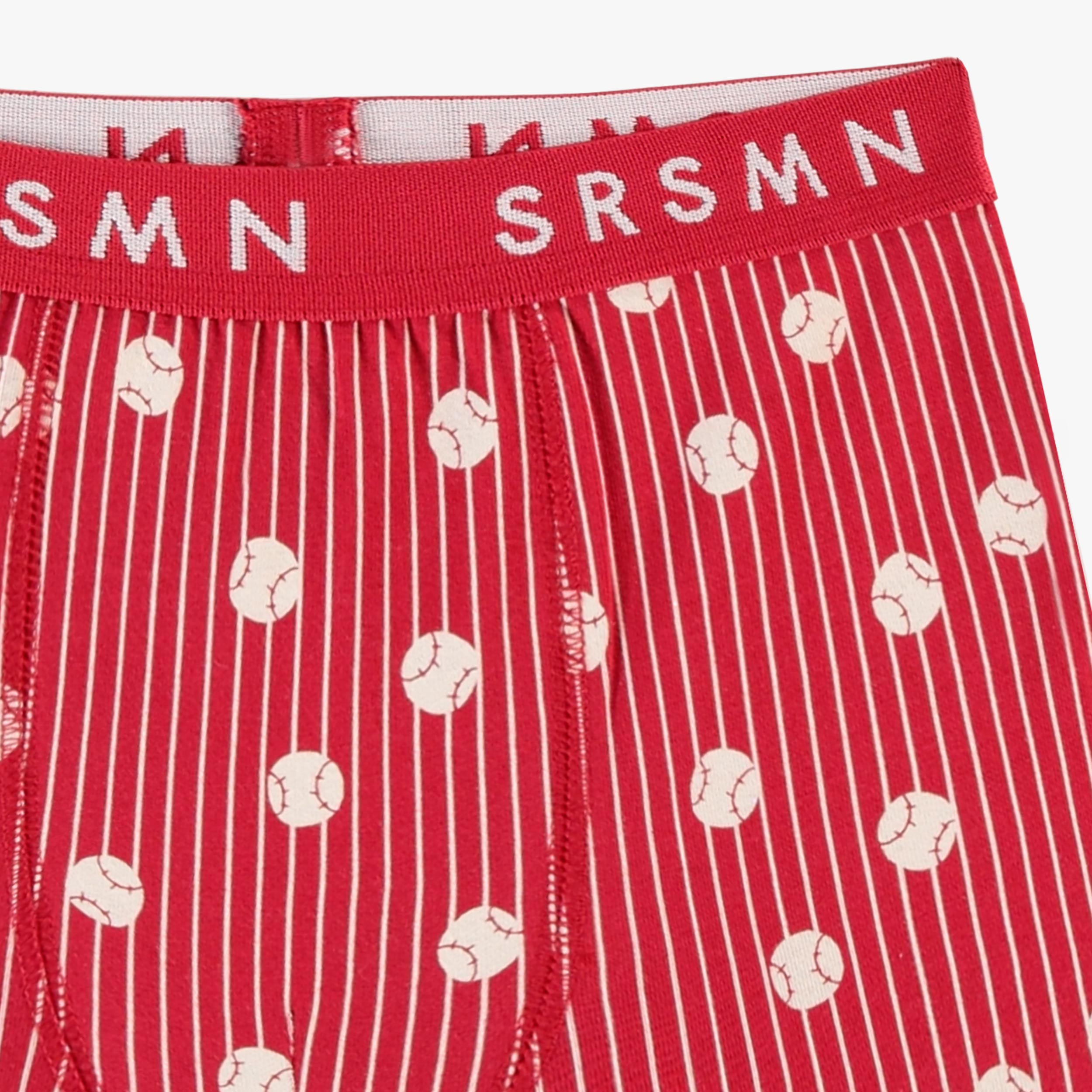 Zoom détails du boxer rouge avec rayures et balles de baseball, enfant