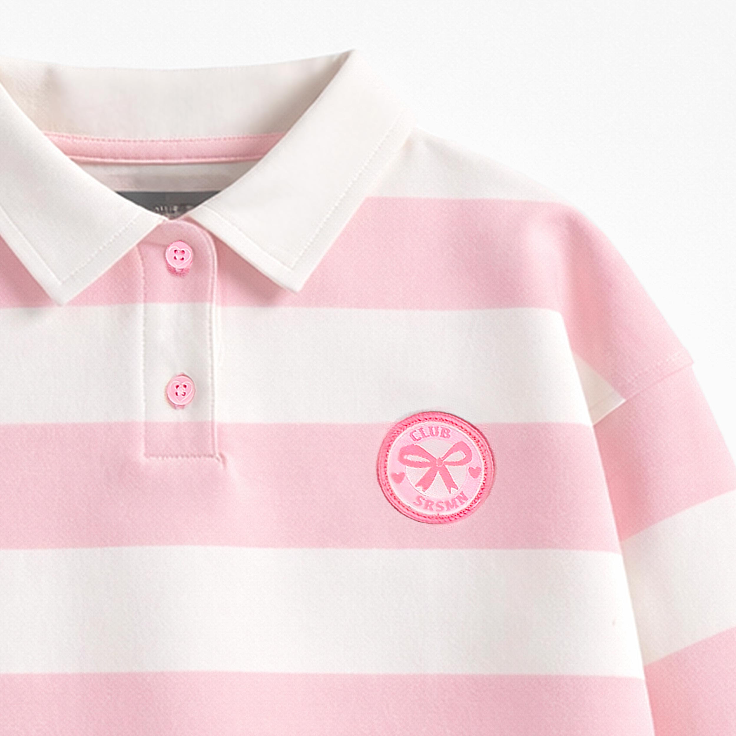 Zoom détails du chandail crème et rose à rayures avec col polo, enfant