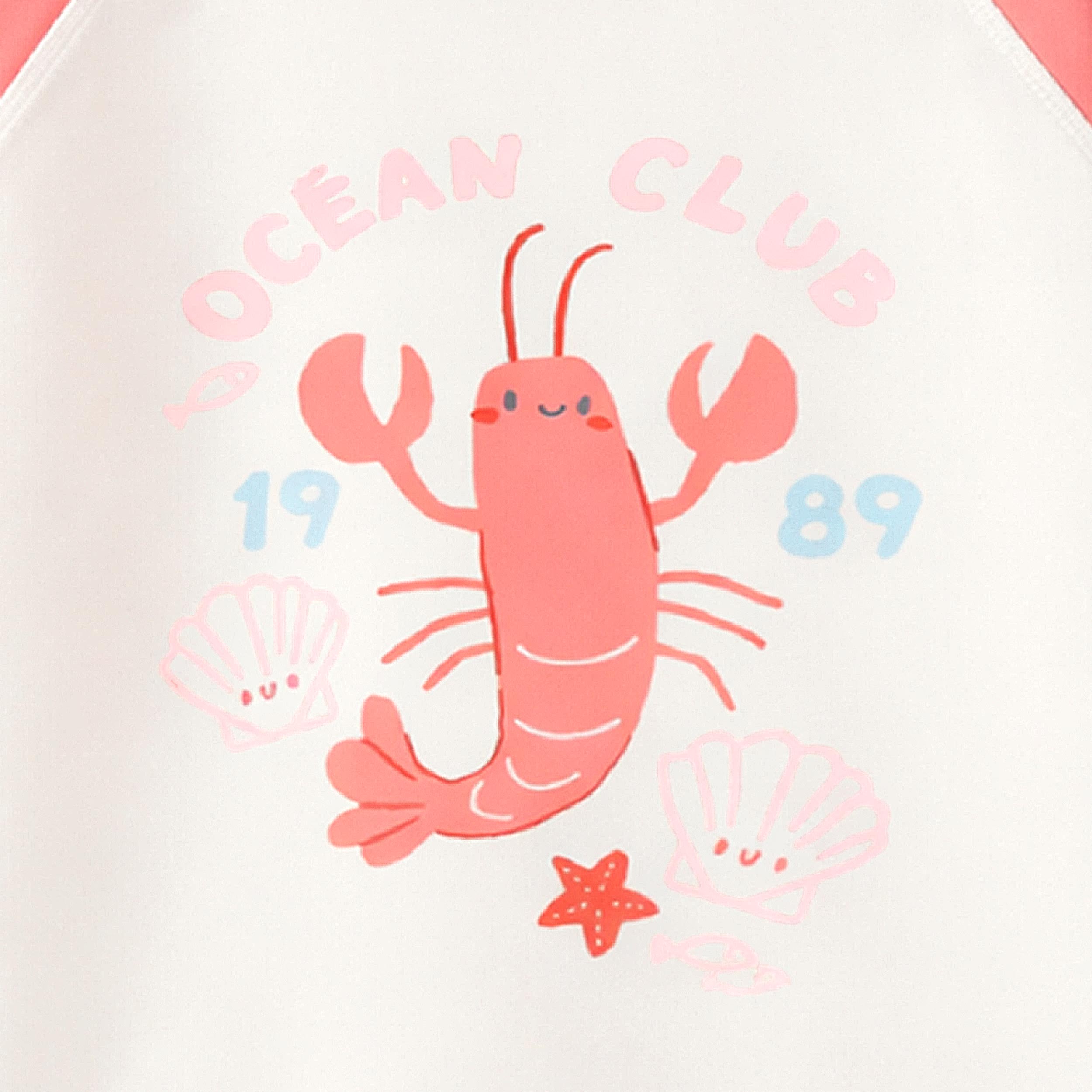 Zoom détails du chandail de bain rose corail et crème avec illustration, enfant