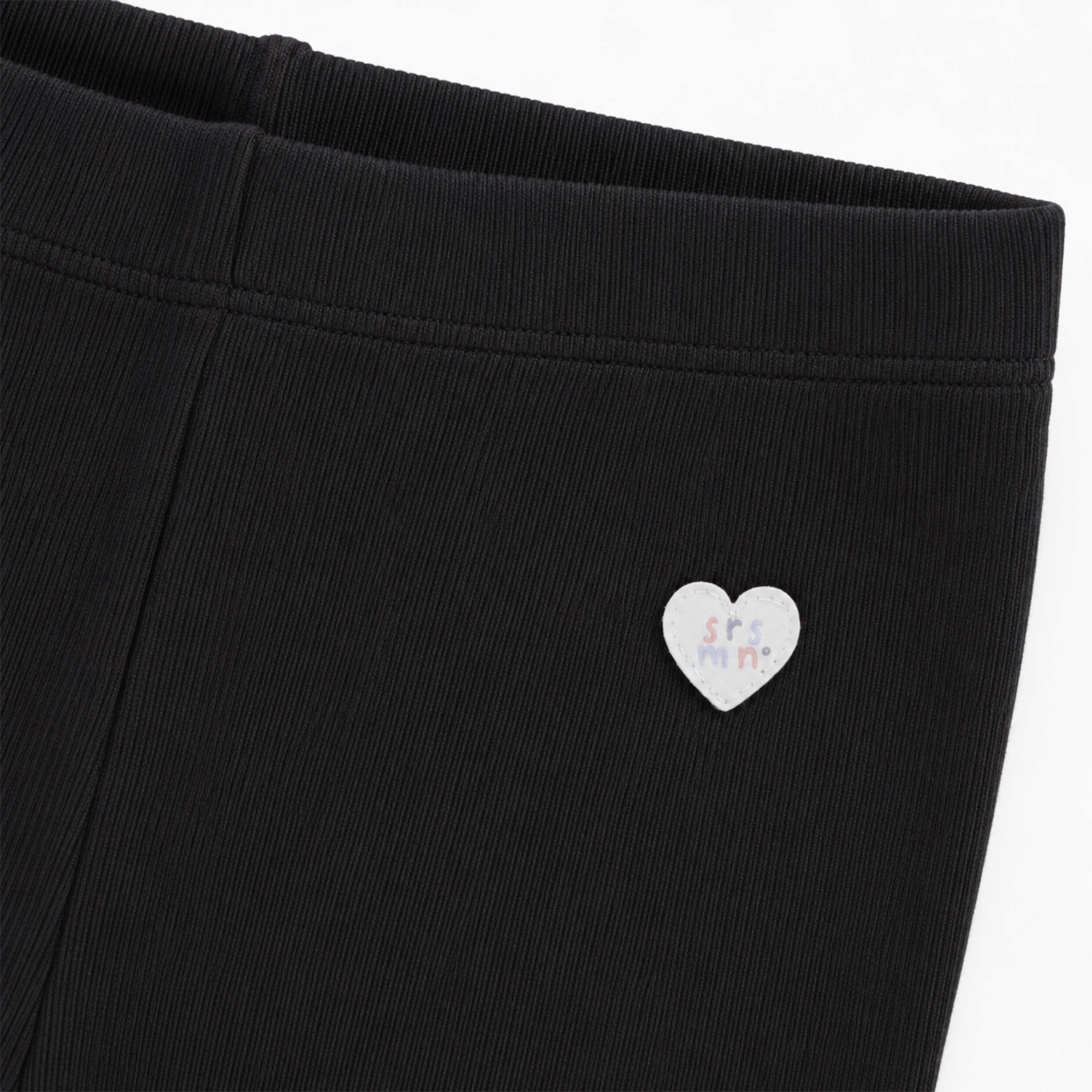 Zoom détails du legging noir en coton côtelé, enfant