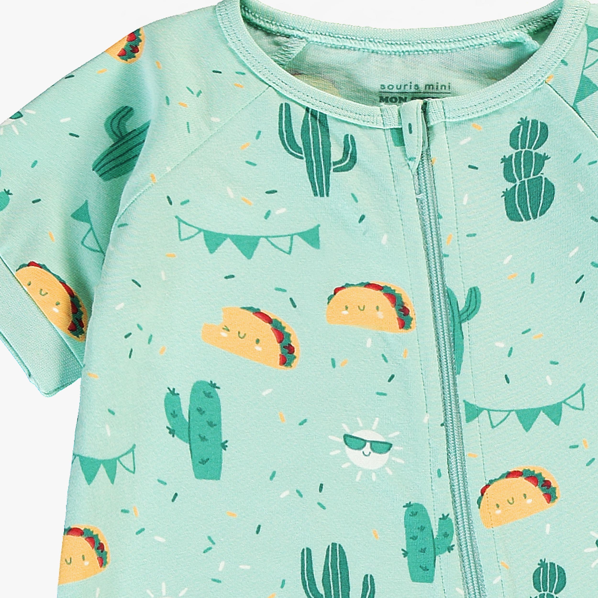 Zoom détails du pyjama une pièce vert à motifs fiesta, bébé