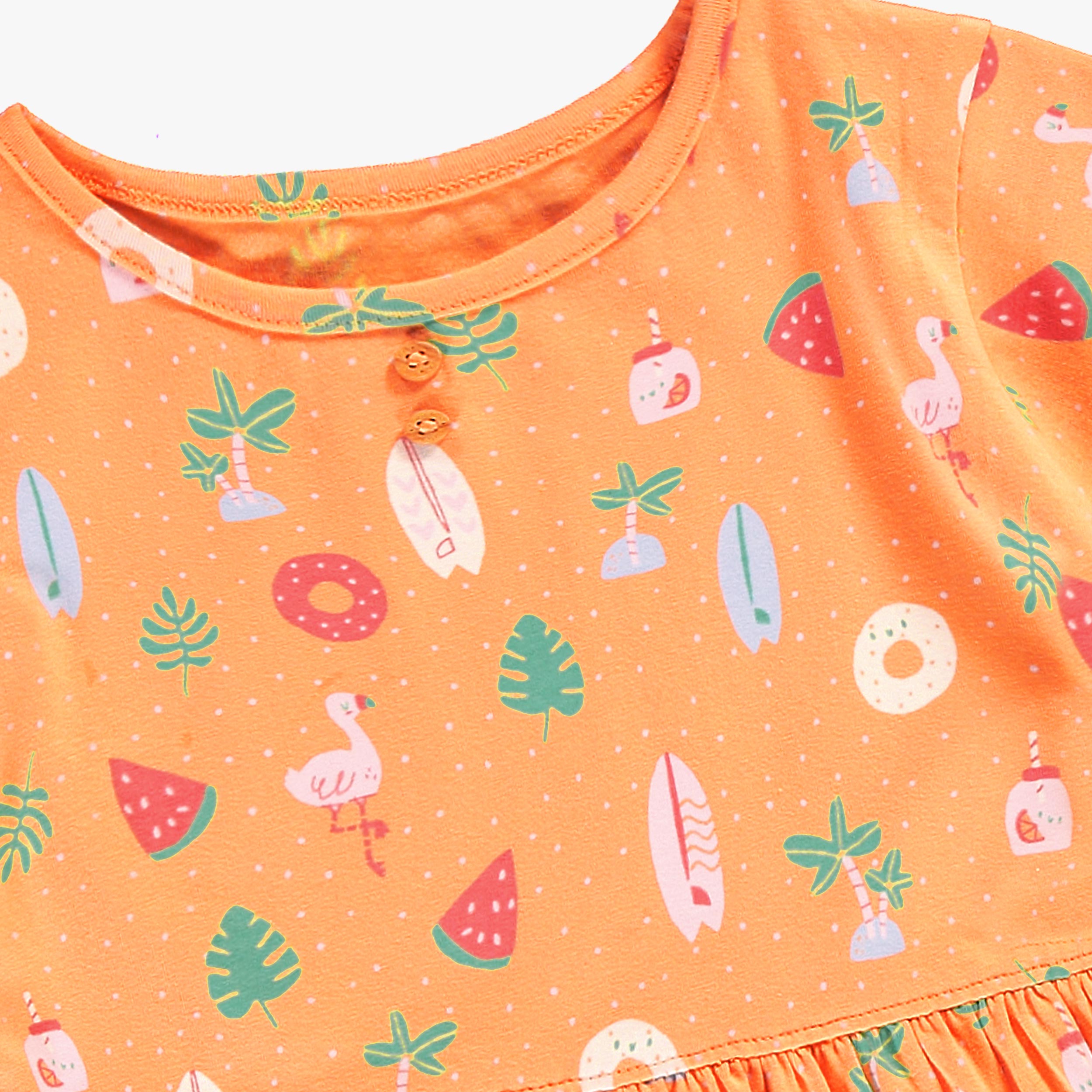 Zoom détails de la robe orange à motifs, enfant