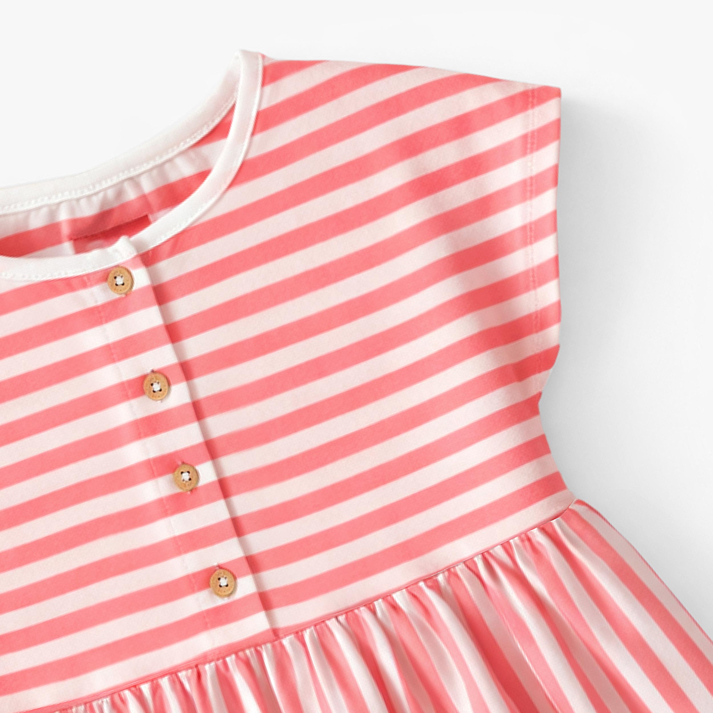 Zoom détails de la robe rose et crème à rayures, enfant