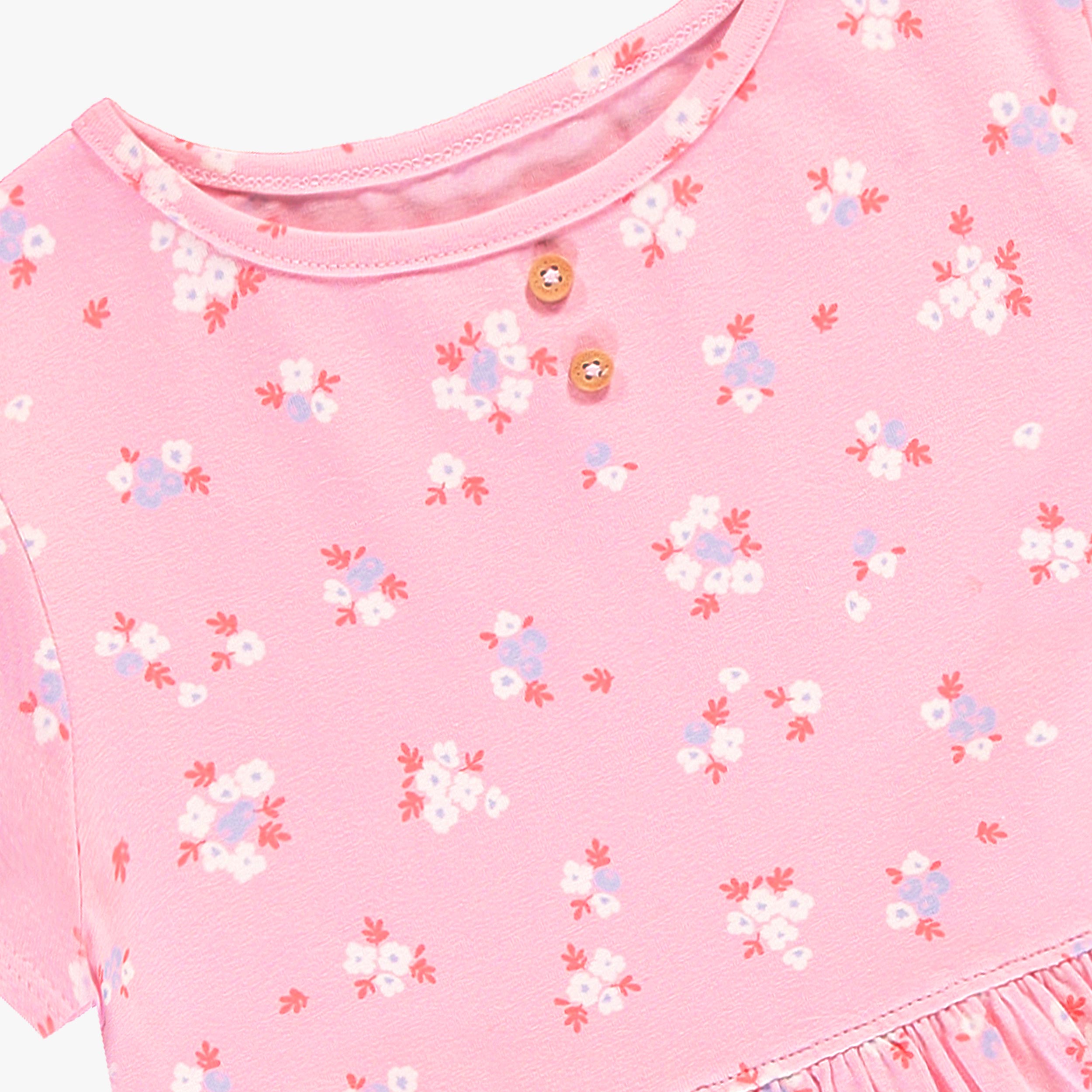 Zoom détails de la robe rose à motif floral, enfant