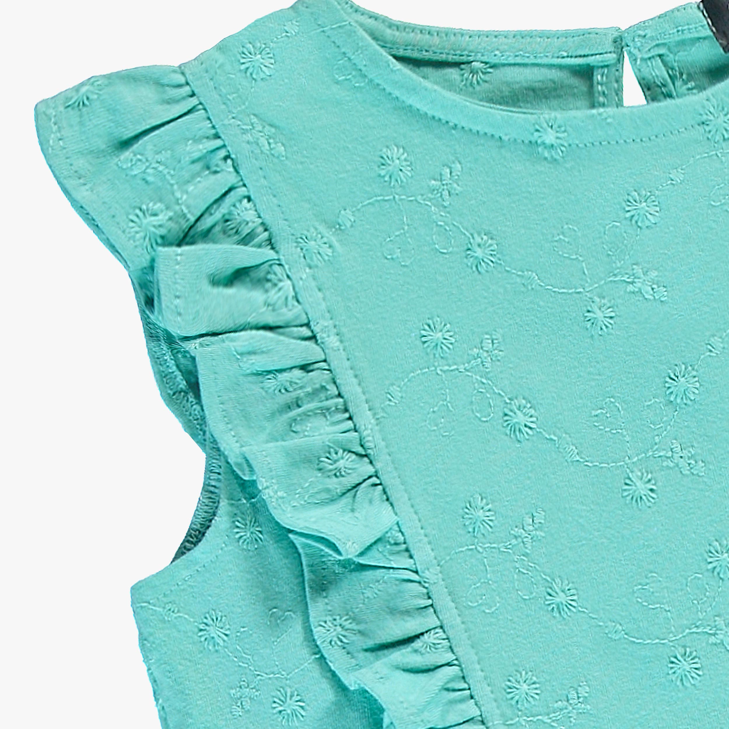 Zoom détails de la robe turquoise avec broderies, enfant