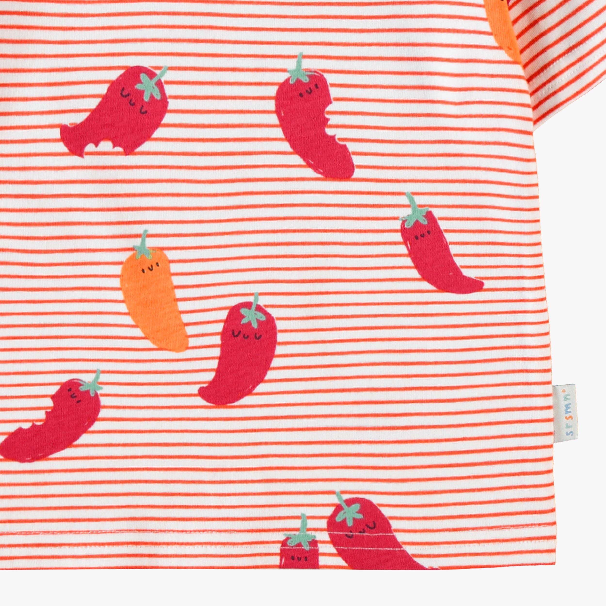Zoom détails du t-shirt crème à rayures rouges et motifs de piments, bébé
