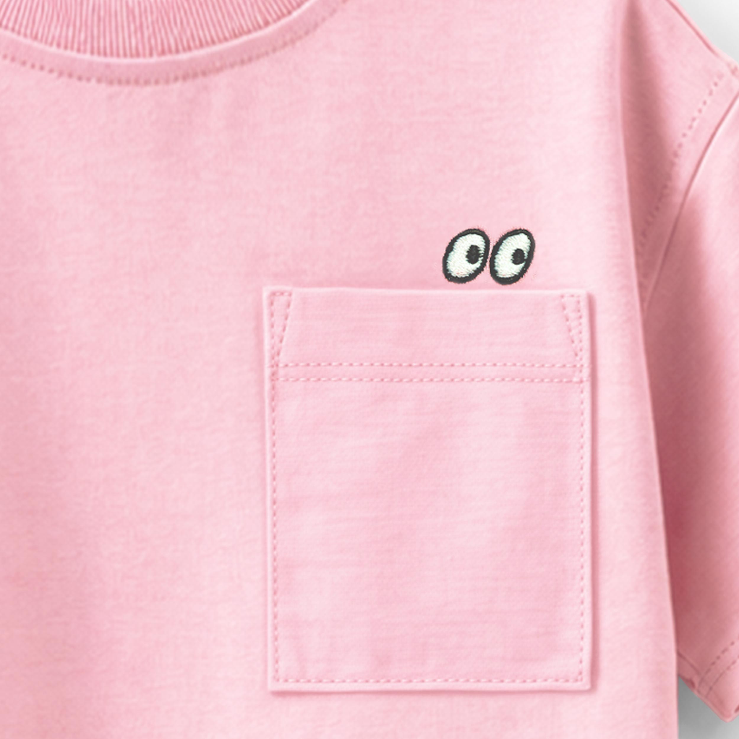 Zoom détails du t-shirt rose avec poche, enfant