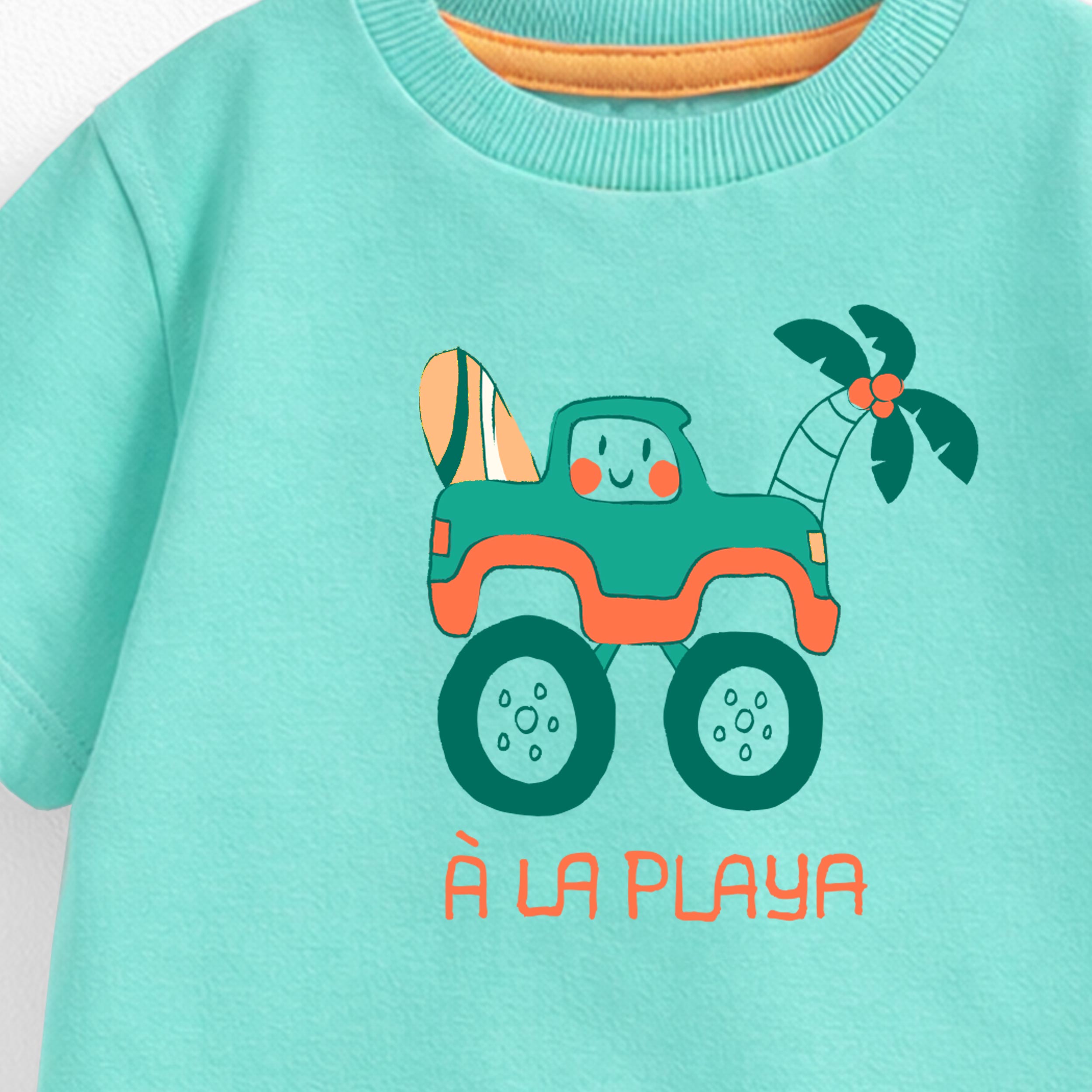 Zoom détails du T-shirt turquoise avec illustration, bébé