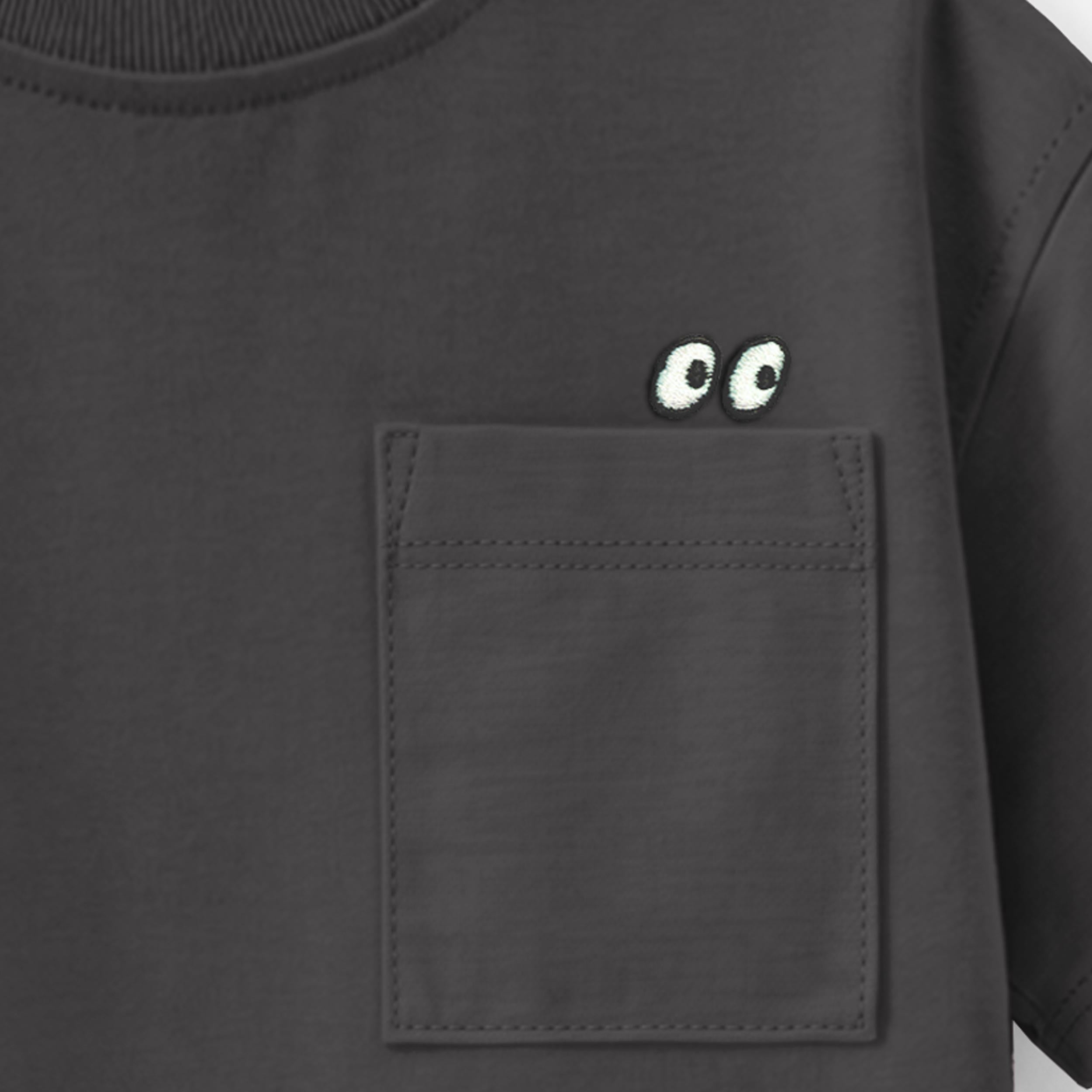 Zoom détails du t-shirt noir avec poche, enfant