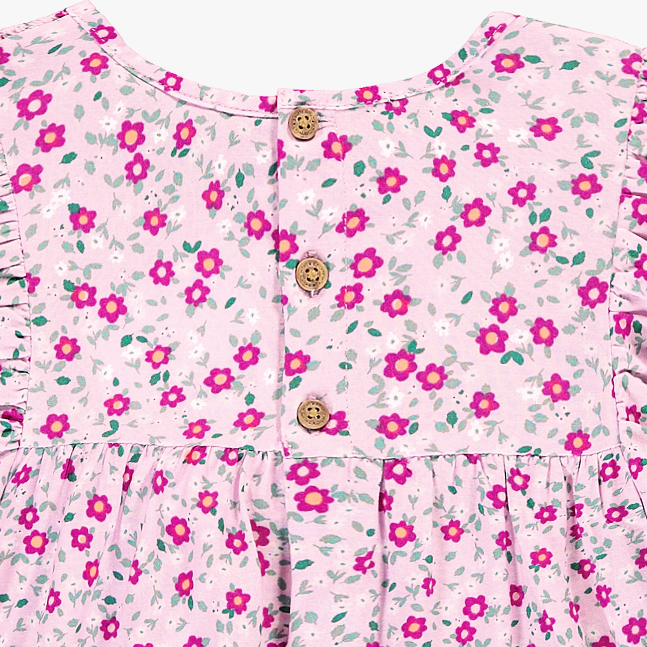 Zoom détails boutons de la robe lilas à motif floral, enfant
