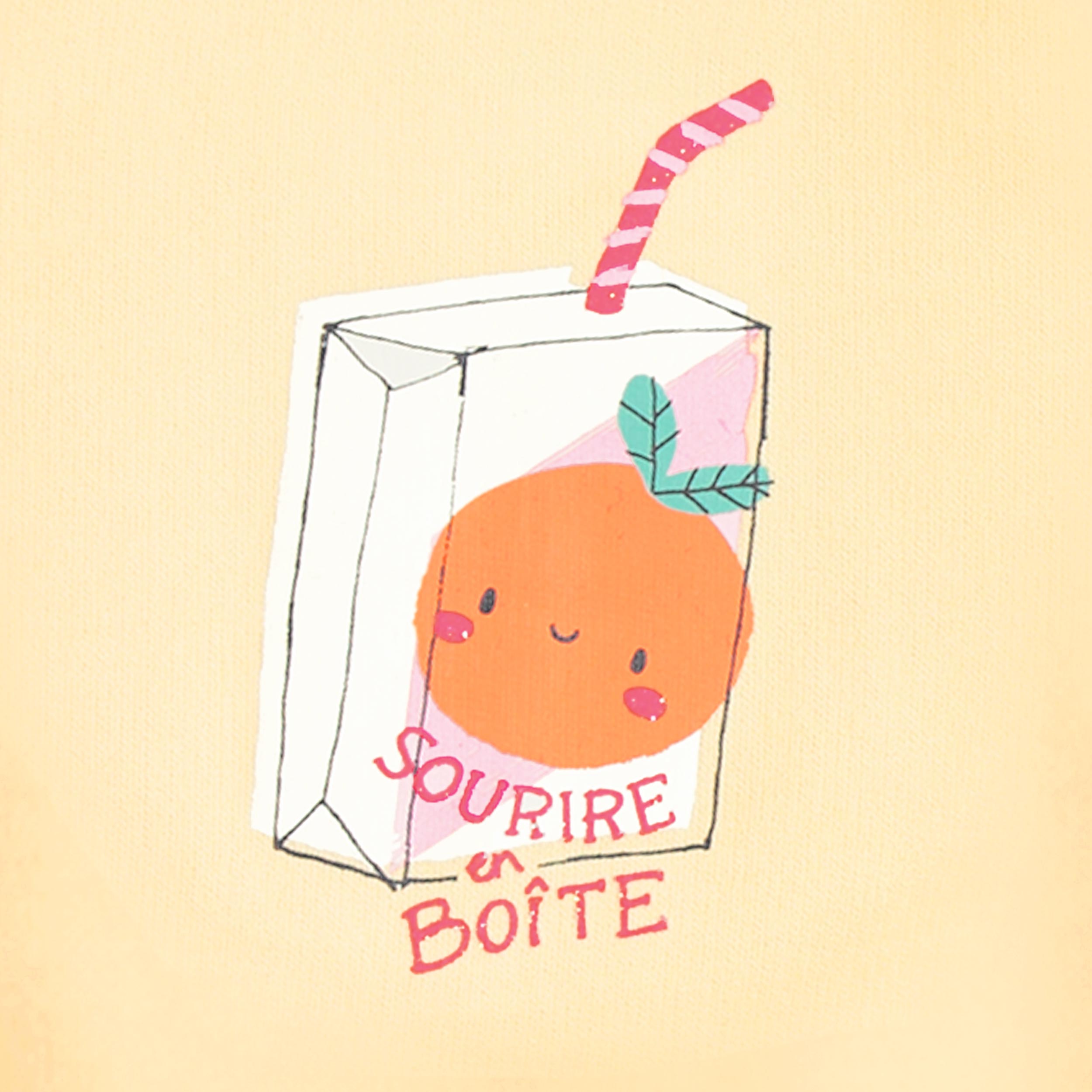 Zoom détails du chandail jaune avec illustration, bébé