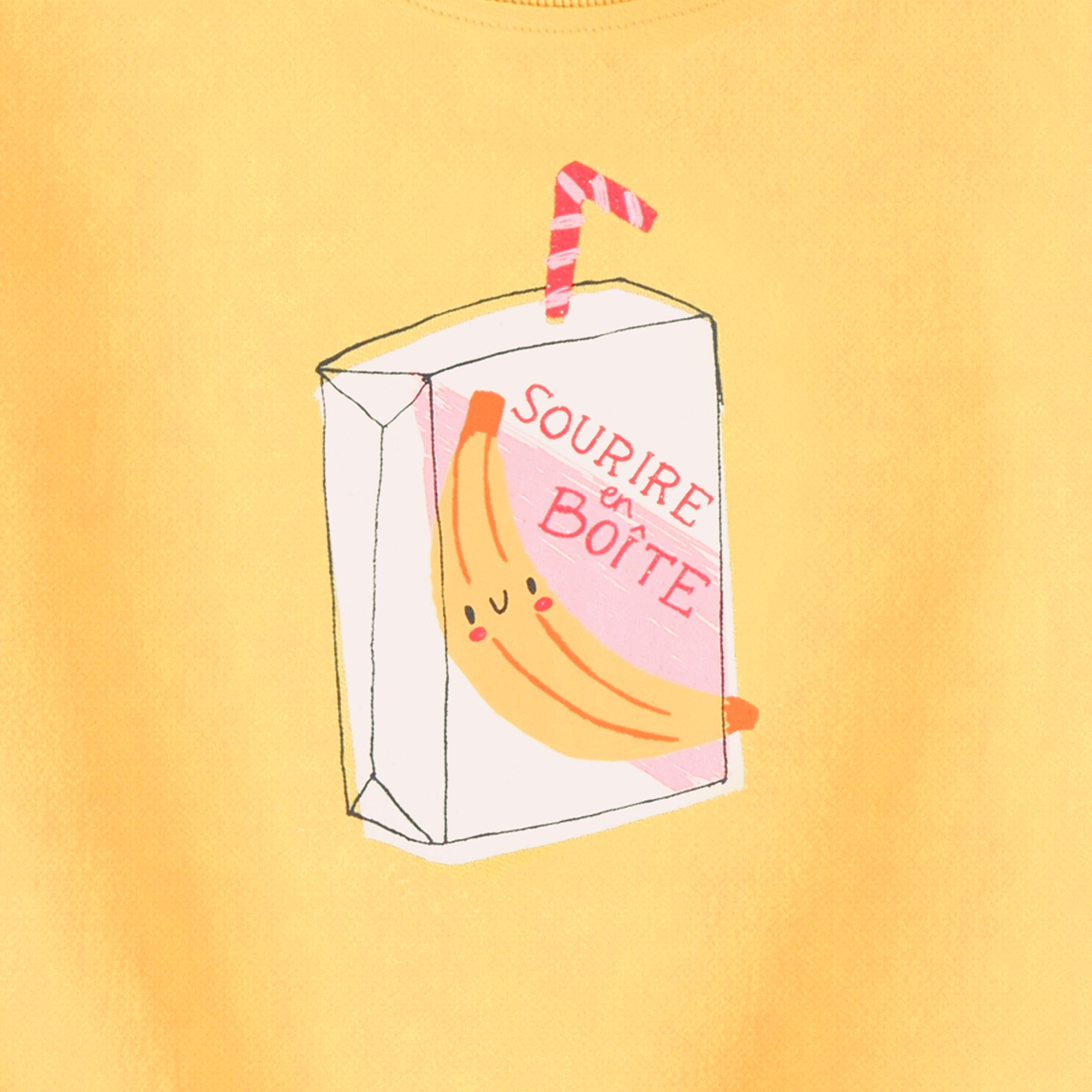 Zoom détails du chandail jaune avec illustration, enfant