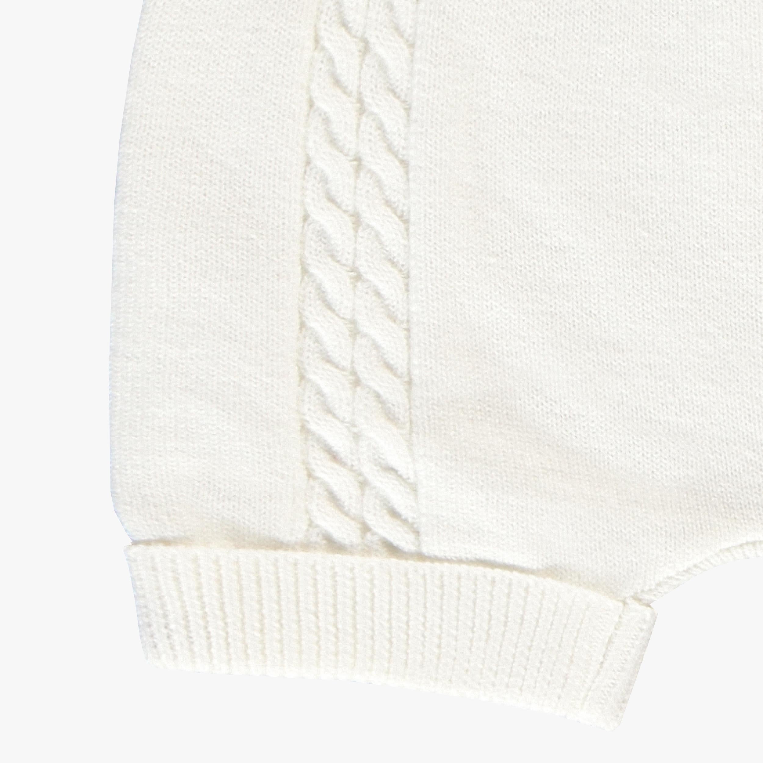 Zoom détails torsades du short crème en tricot, naissance
