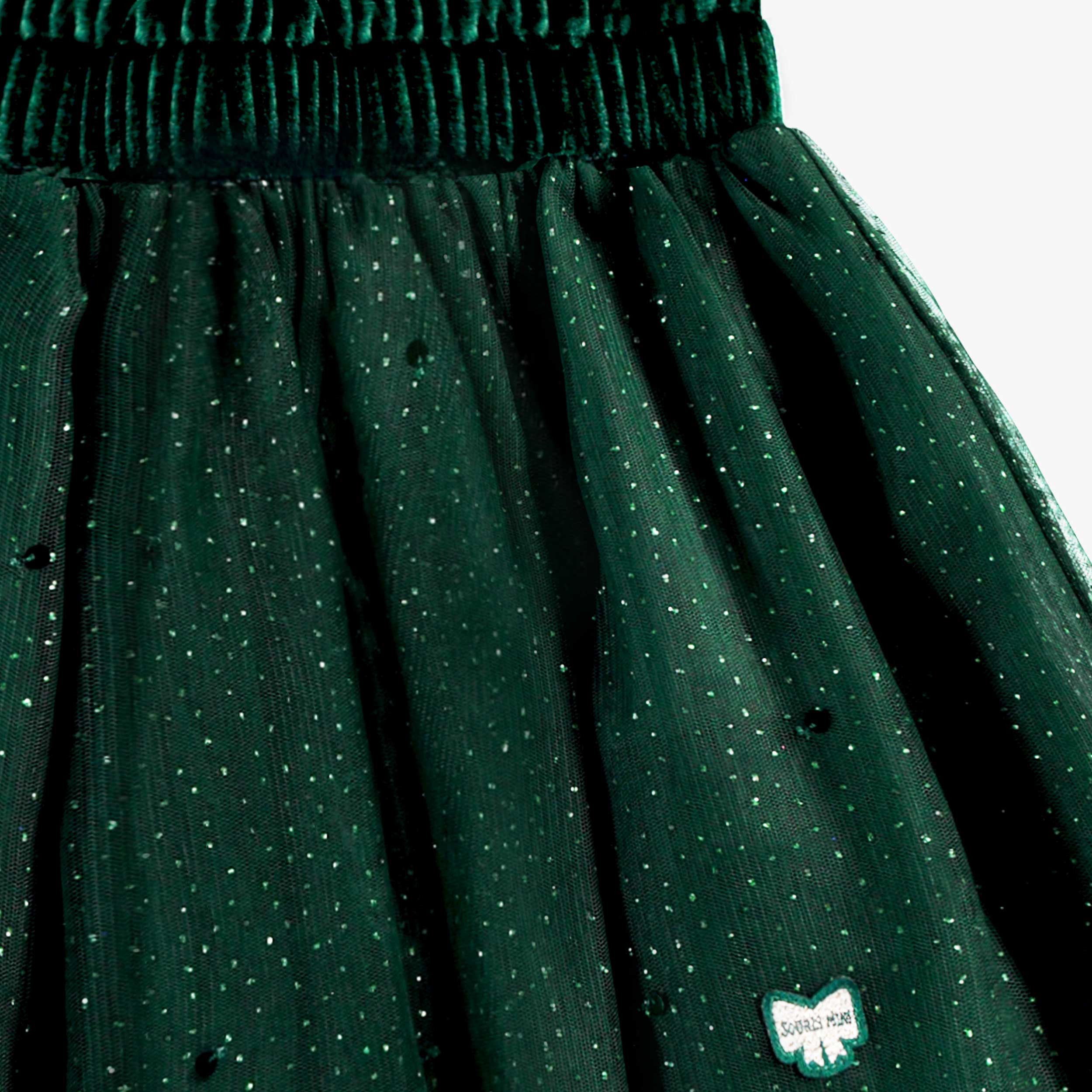Zoom détails de la jupe verte en paillettes, enfant