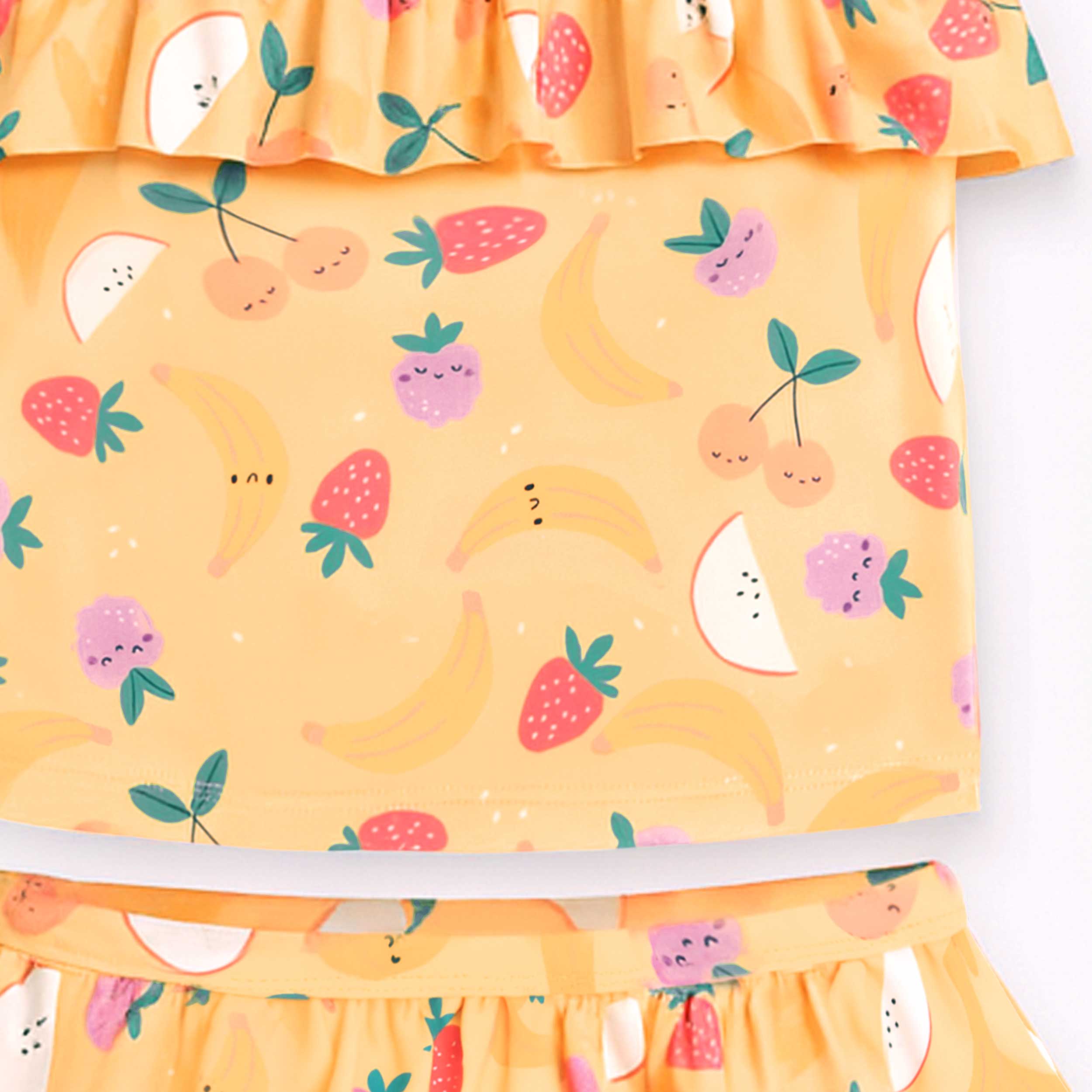 Zoom maillot de bain deux pièces jaune à motifs fruités, enfant