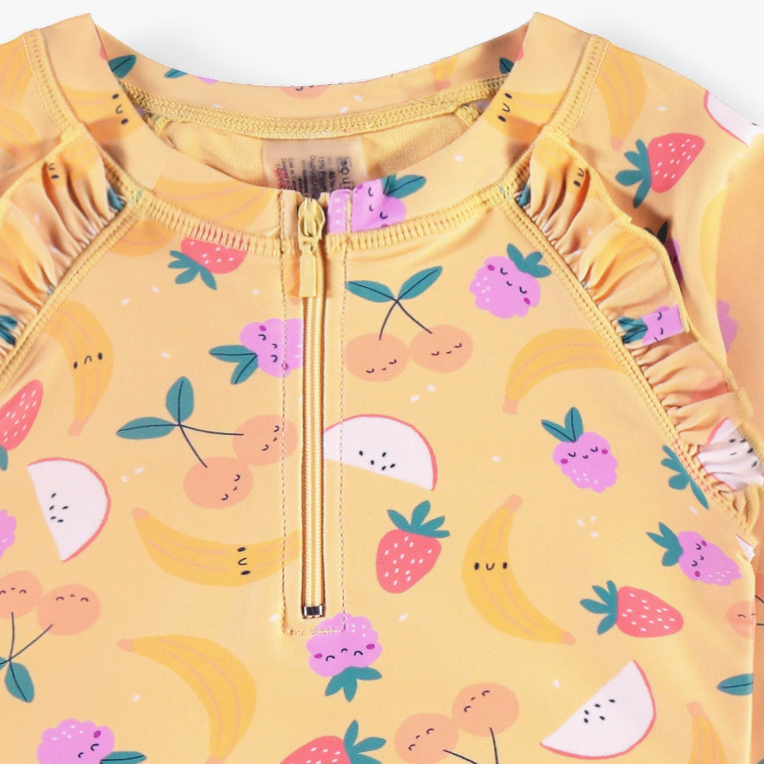 Zoom détails du maillot de bain une pièce jaune à motifs fruités, enfant - Souris Mini