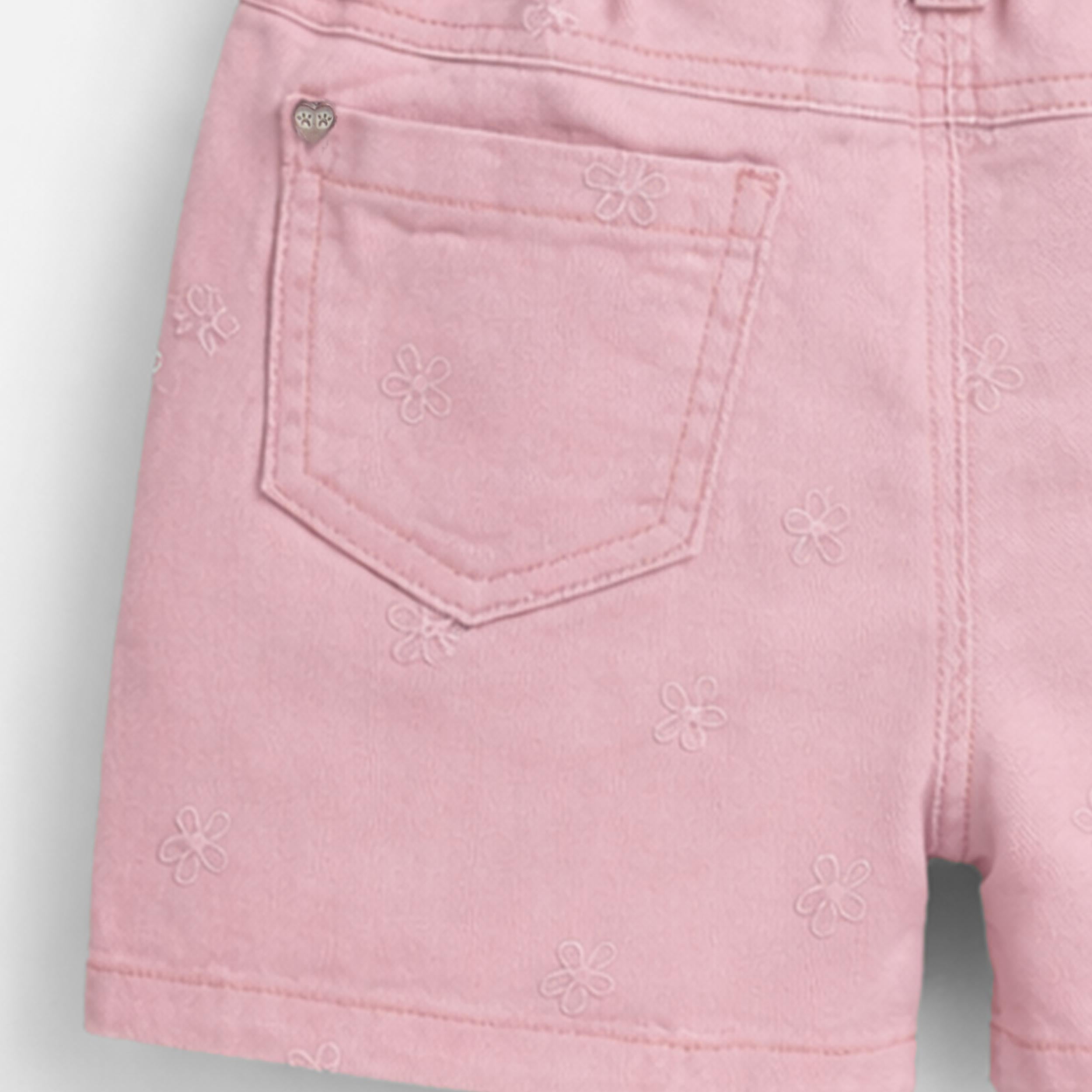 Zoom détails du short rose en denim avec broderies de fleurs, enfant