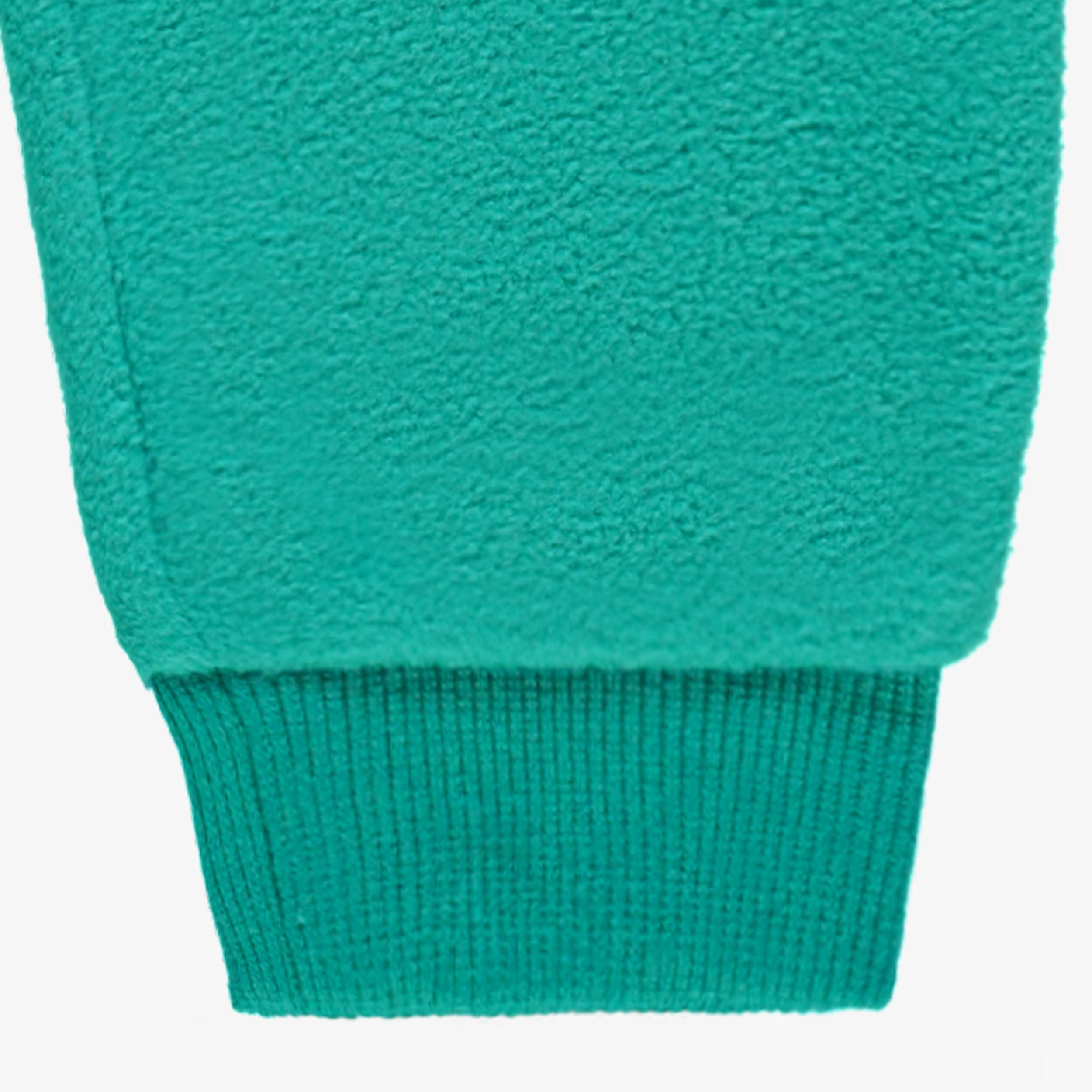 Zoom sur cheville du pantalon en polar turquoise, bébé - Souris Mini
