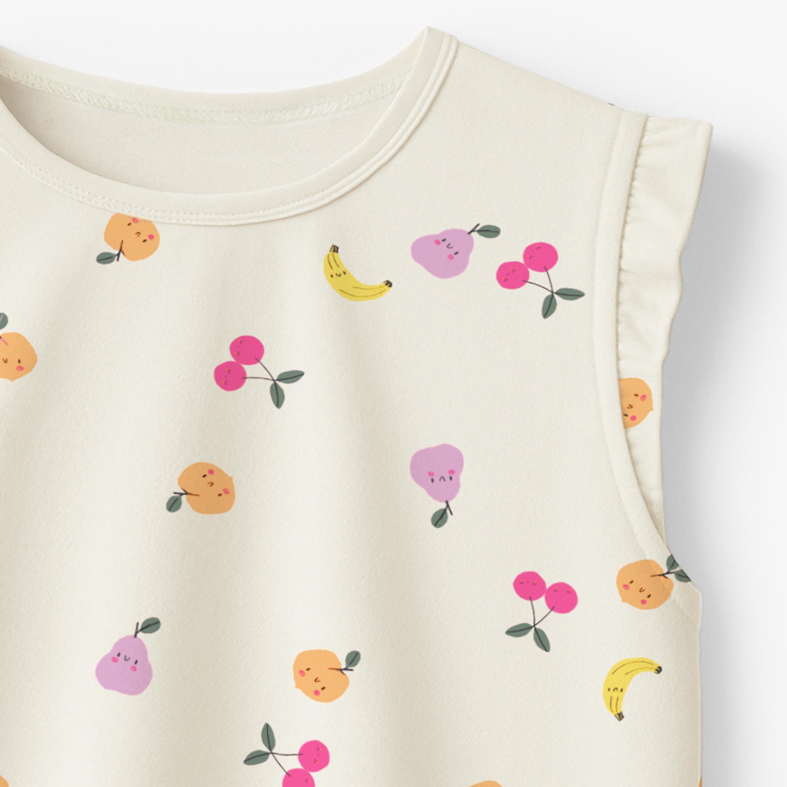 Zoom du t-shirt sans manches crème à motifs de fruits, bébé