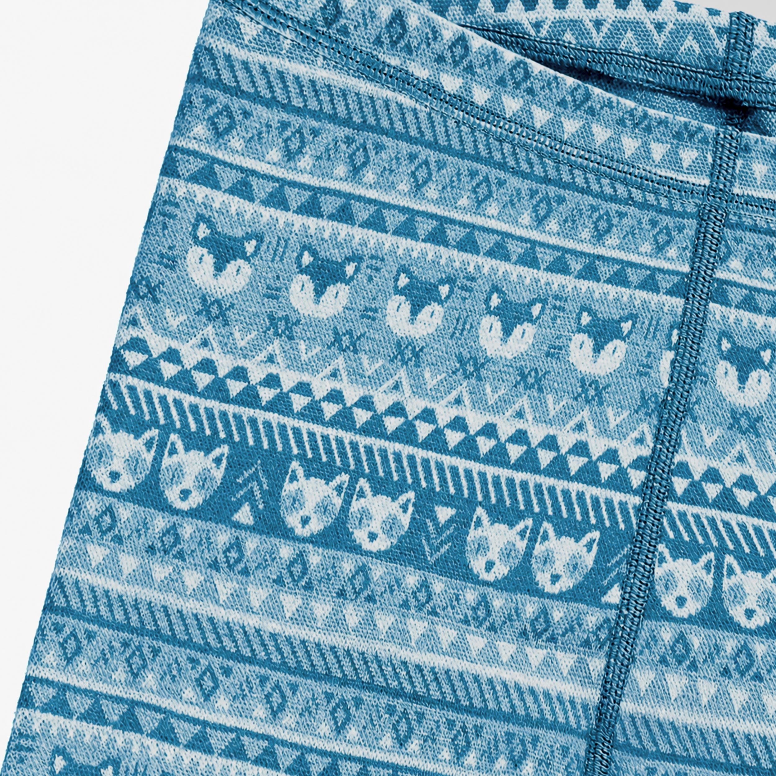 Zoom détails du legging bleu en laine mérinos à motifs, enfant