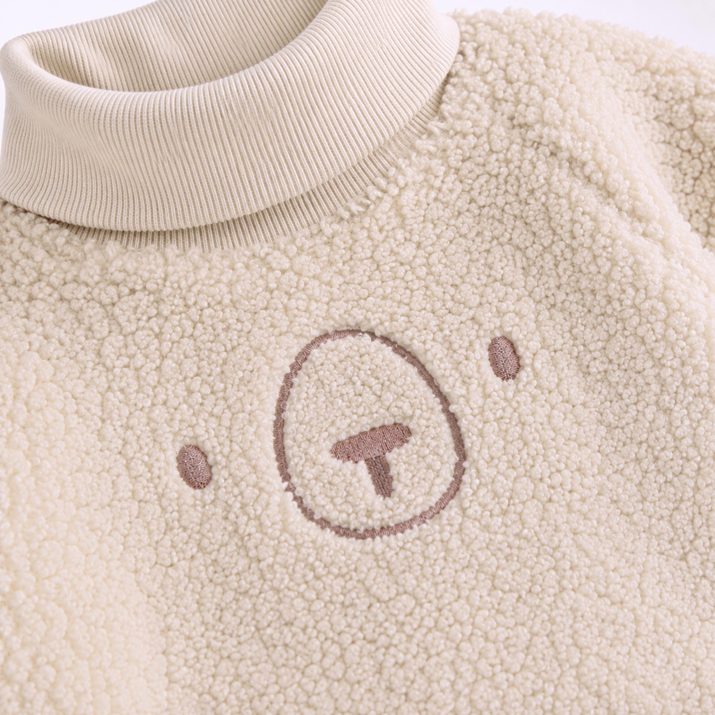Zoom du chandail en sherpa beige, enfant - Souris Mini