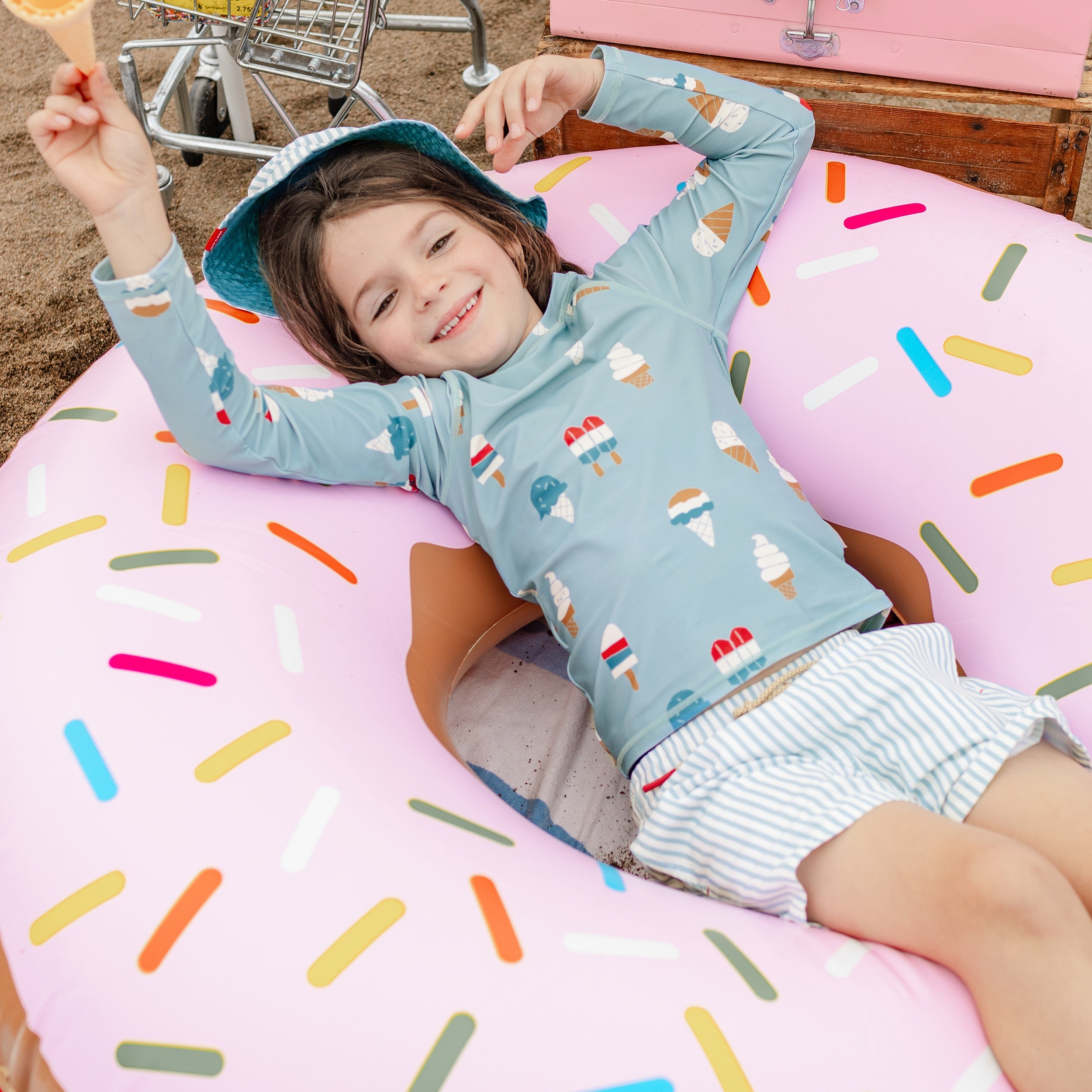 Blue long sleeves swim t-shirt with icy treat print, child
