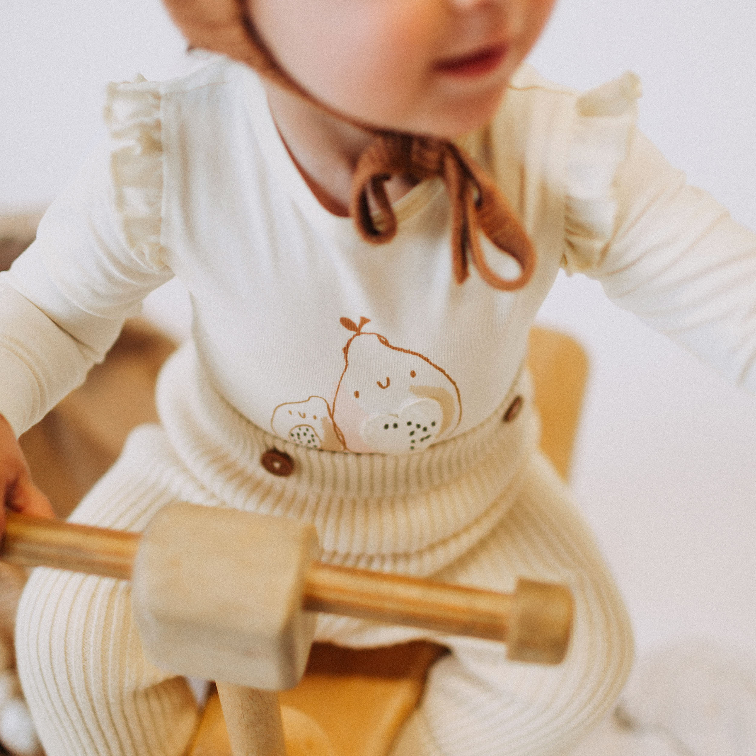 Cream knitted pants with straps in cashmere imitation, newborn