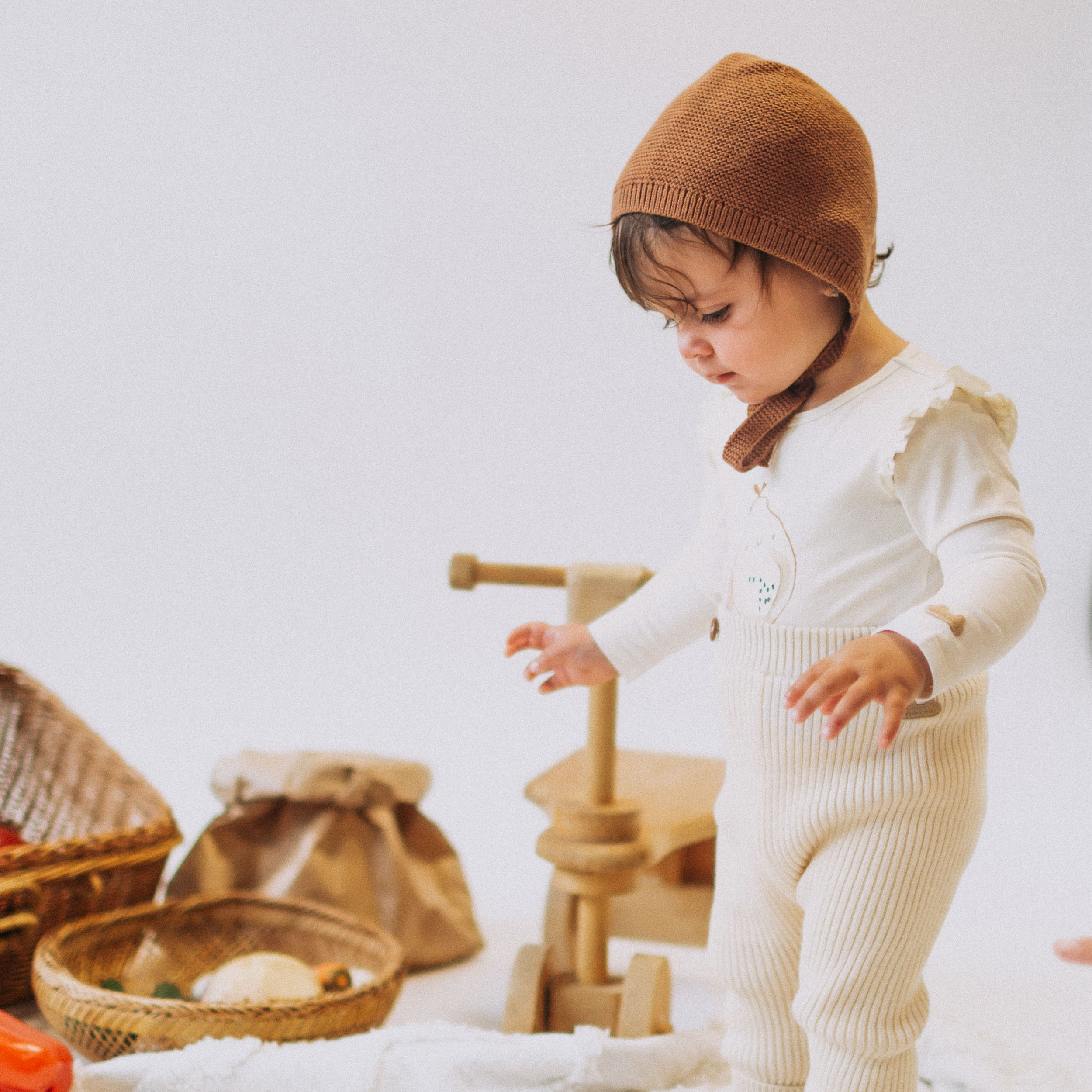 Cream knitted pants with straps in cashmere imitation, newborn