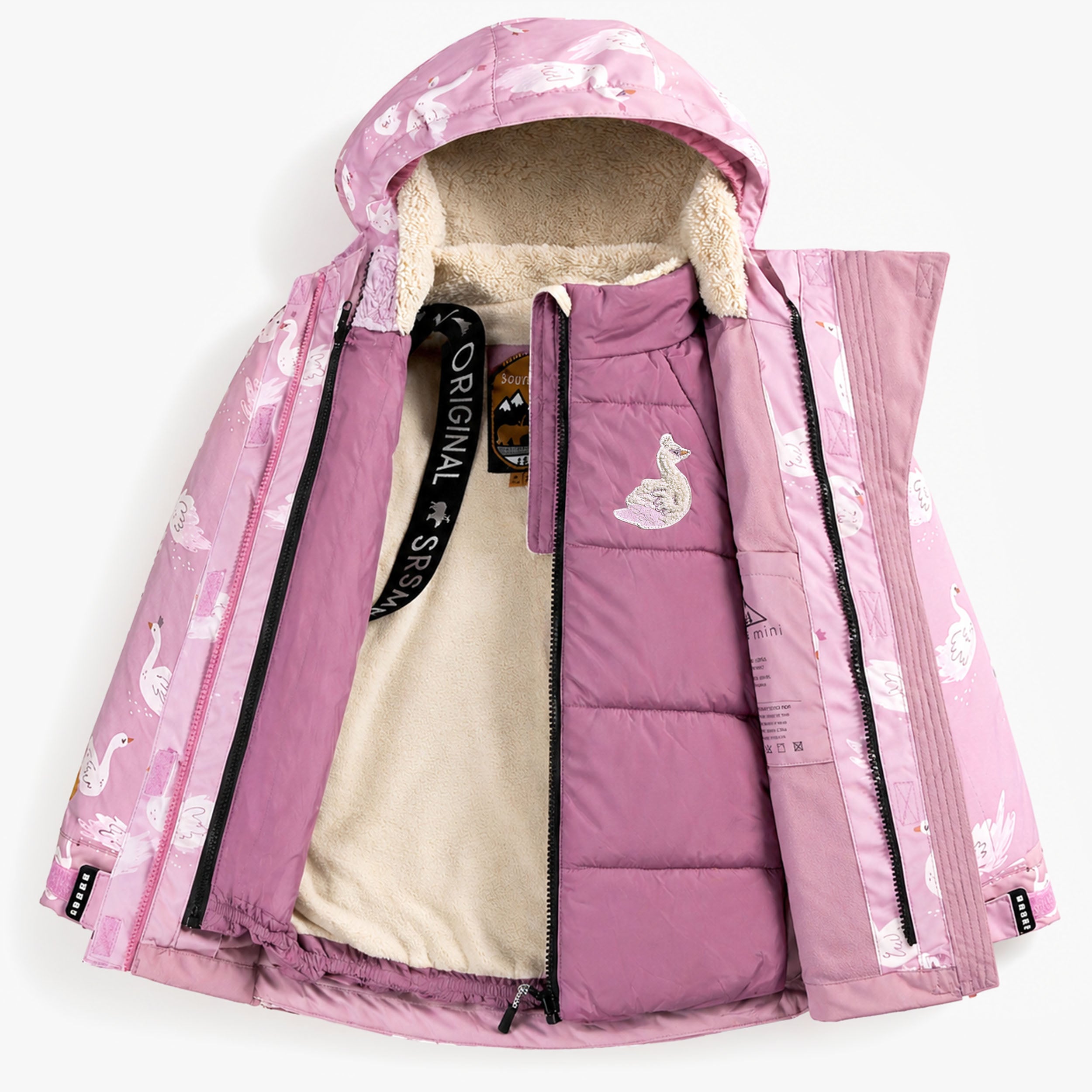Ensemble d’hiver 3-en-1 pour enfant avec manteau rose à imprimé cygnes ouvert à moitié, révélant la doublure sherpa douce et la veste isolée amovible.