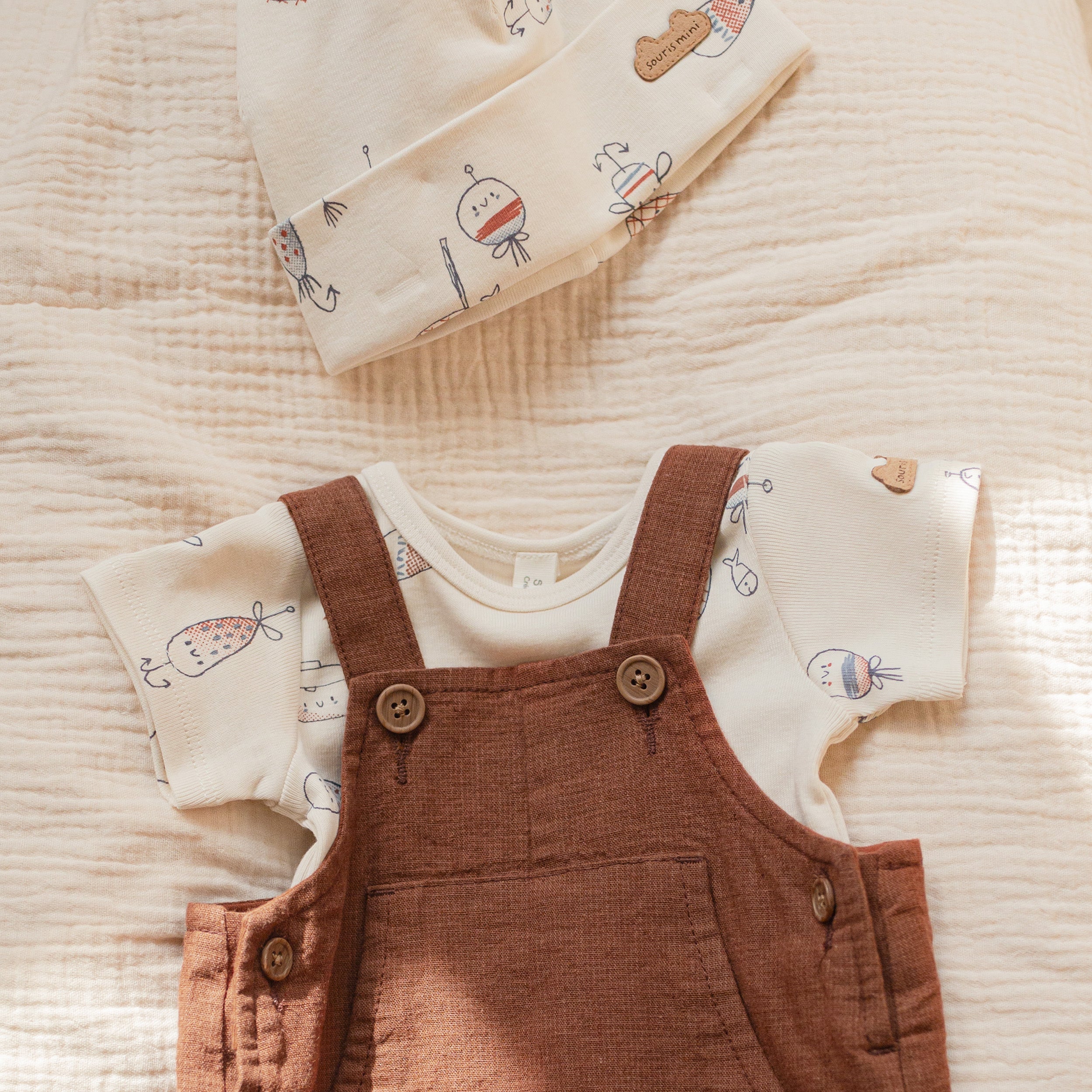 Cream patterned hat in stretch organic cotton, newborn