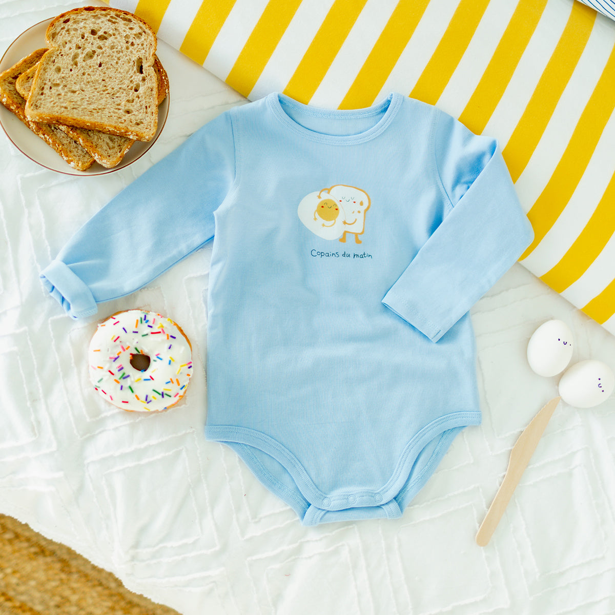 Cache-couche bleu avec illustration, bébé