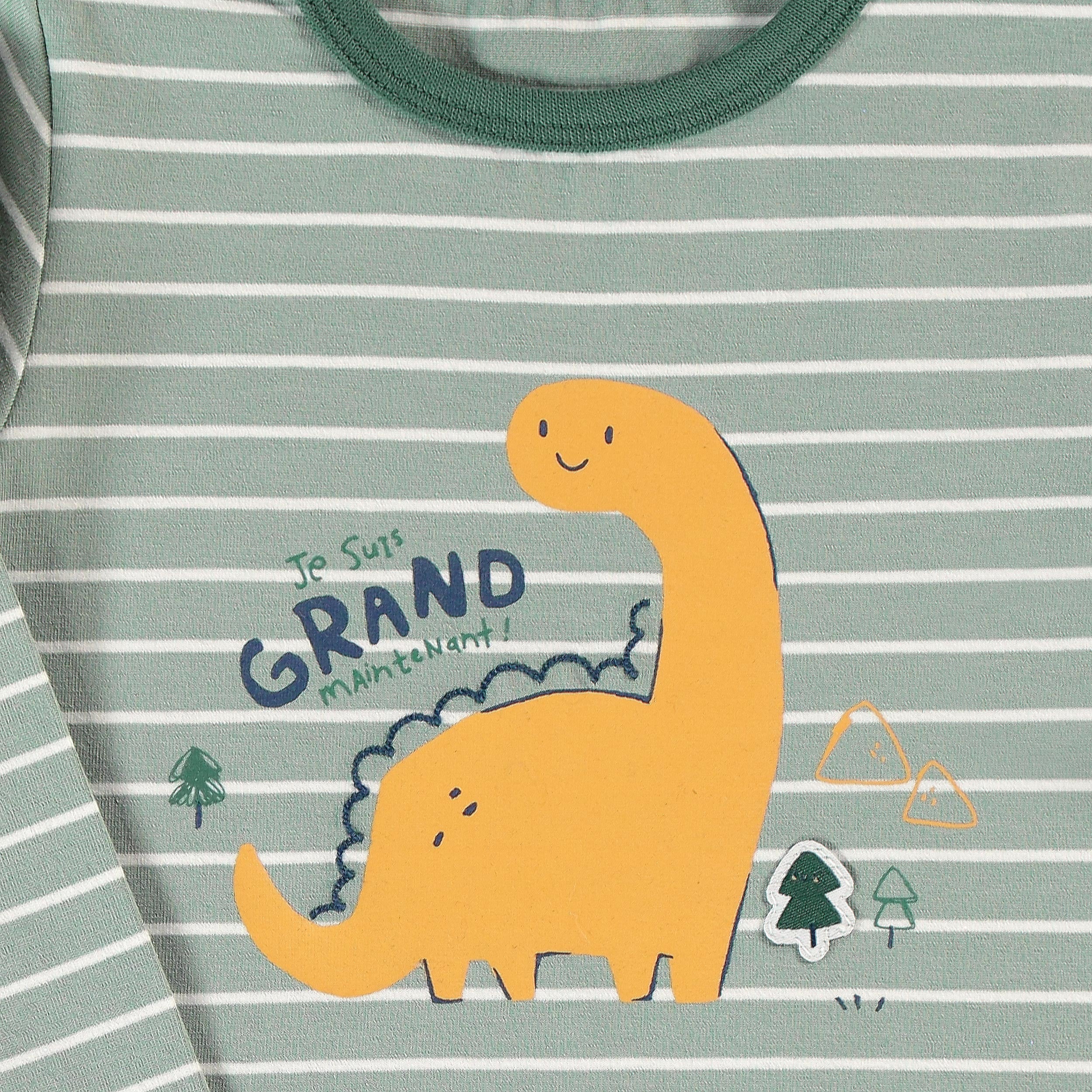 Zoom sur illustration dinosaure jaune sur body bébé rayé vert