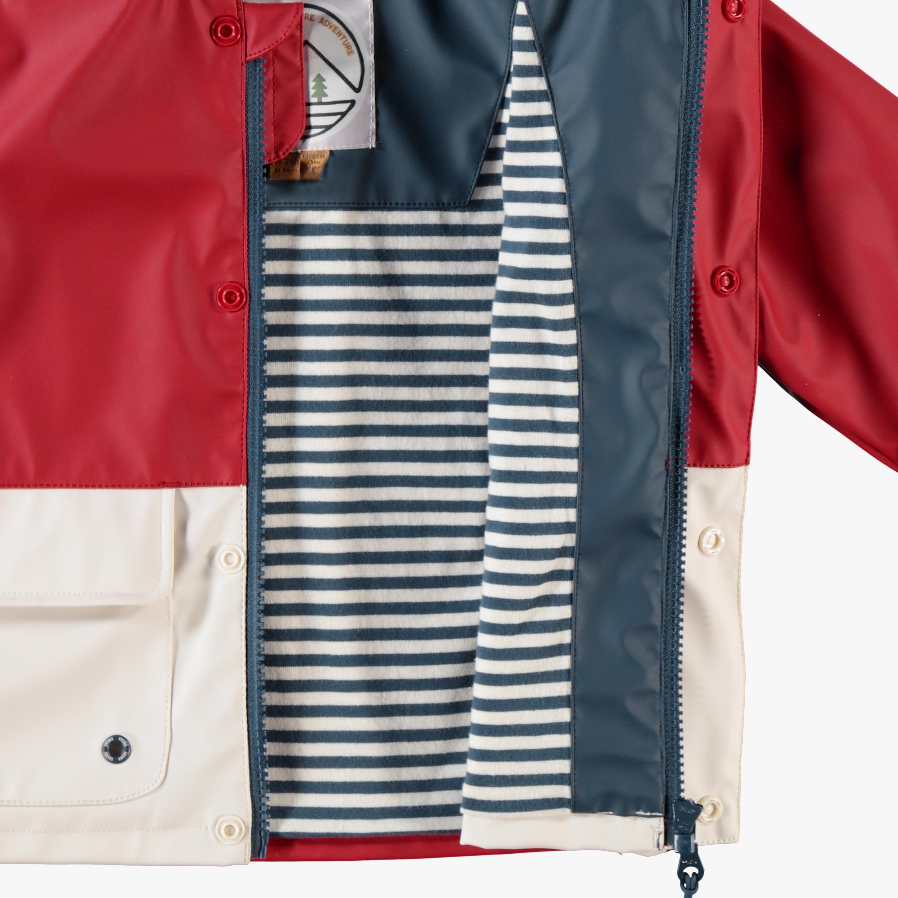 Red and cream raincoat, baby