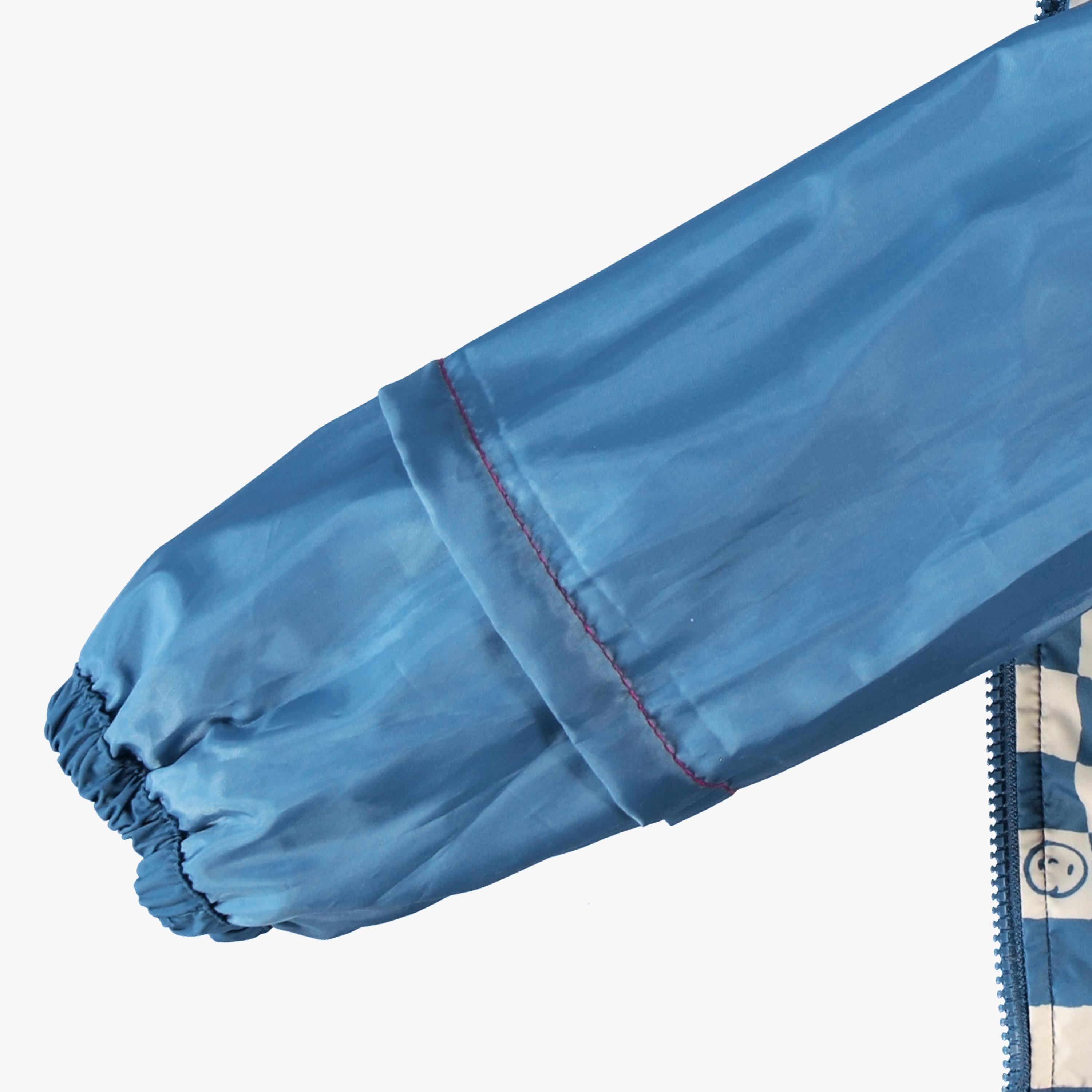 Manteau coupe-vent bleu à motif damier, enfant